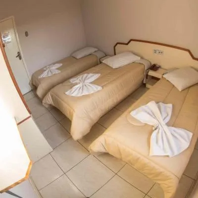 Bed in Hotel Tubarao