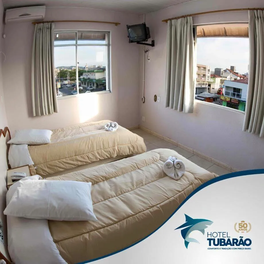 Bed in Hotel Tubarao