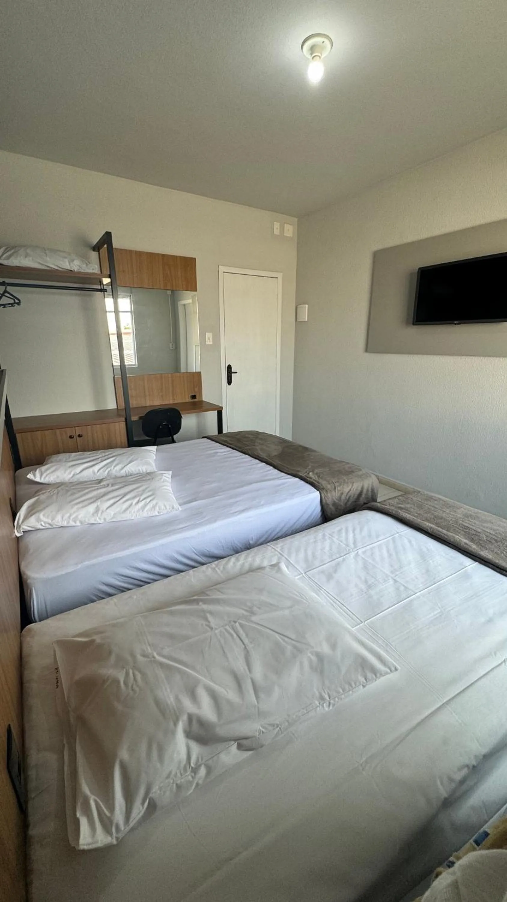 Bed in Hotel Tubarao