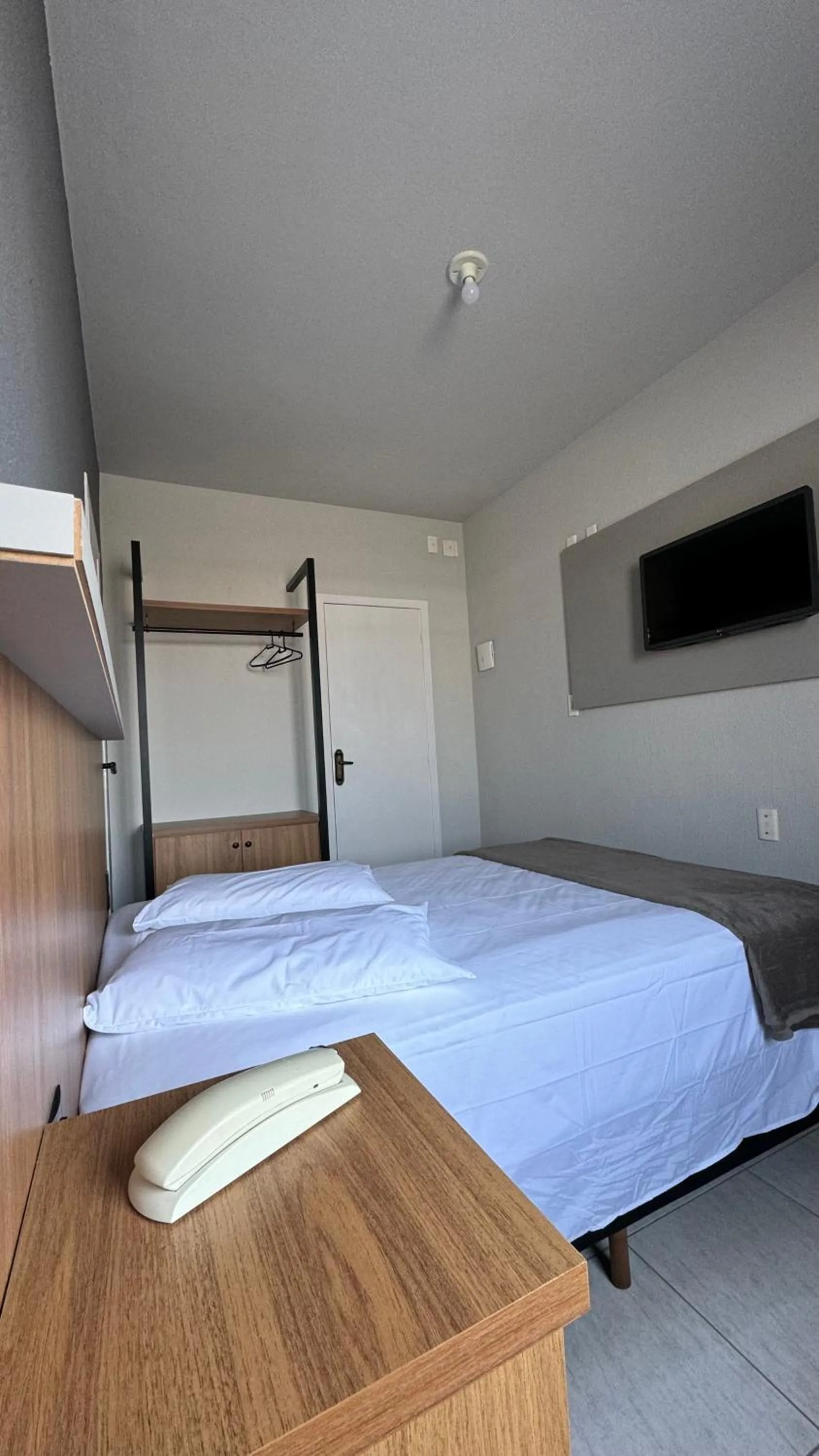 Bed in Hotel Tubarao