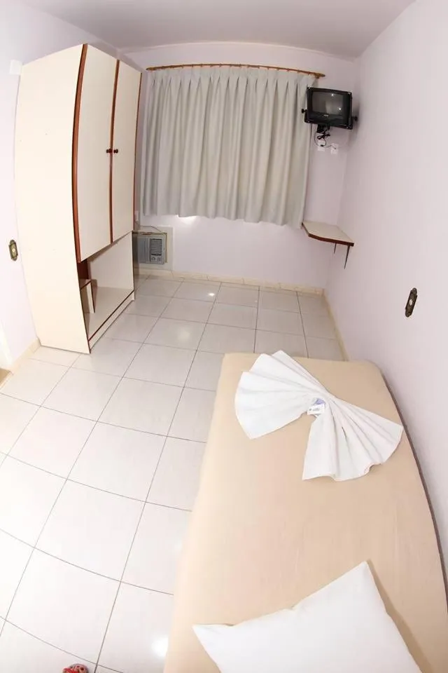 Bed in Hotel Tubarao