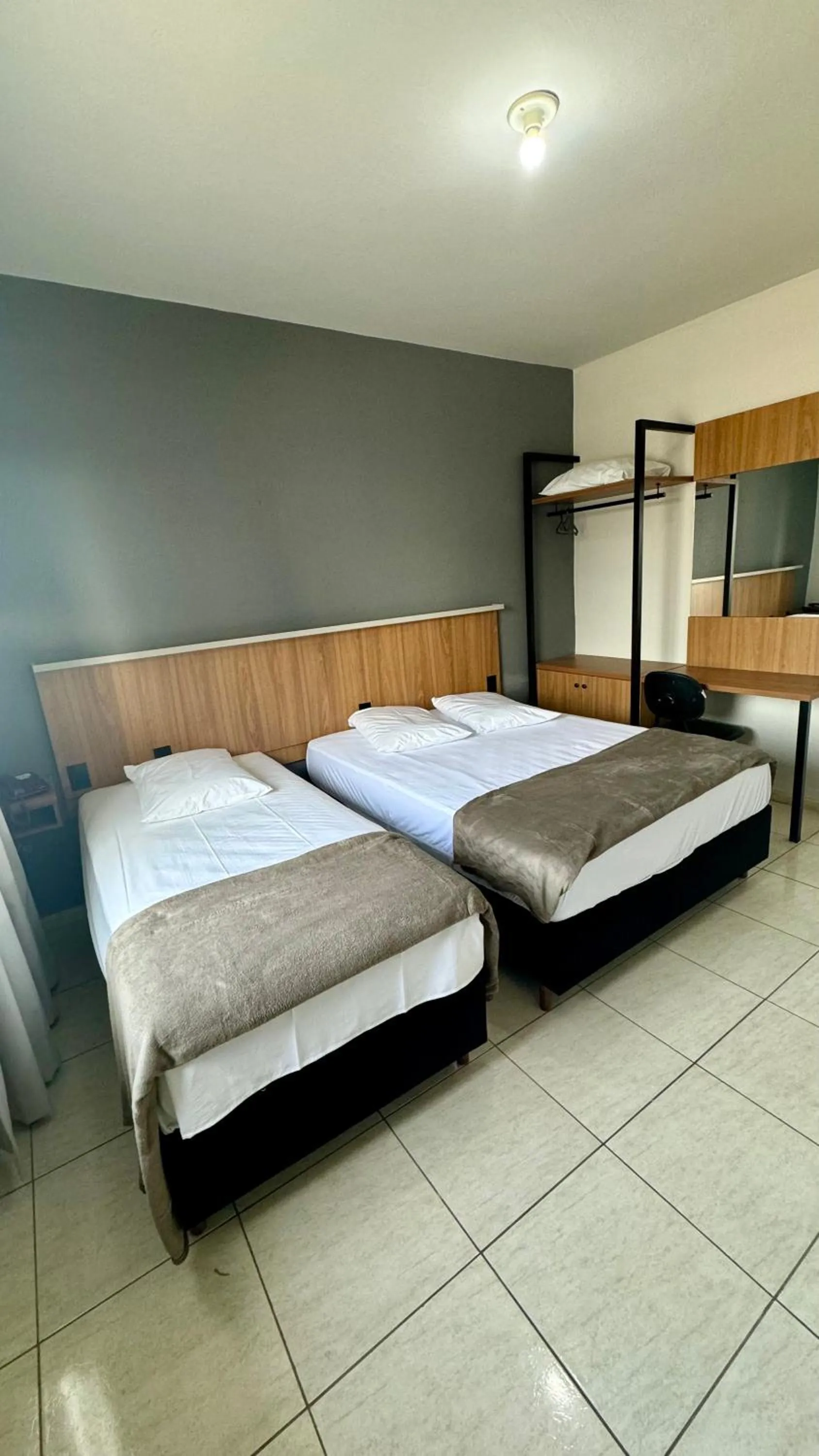 Bed in Hotel Tubarao