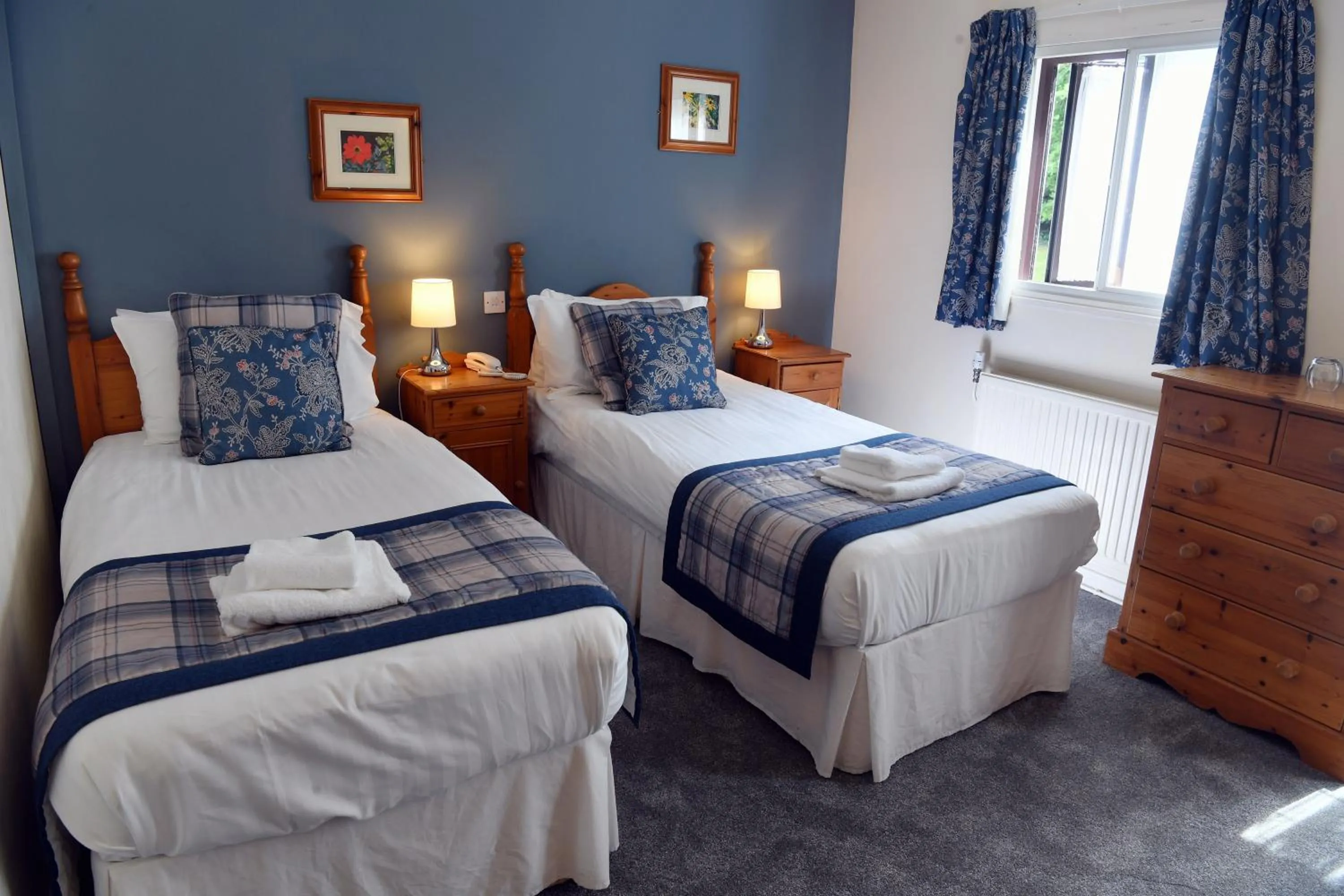 Bed in The Greyhound Inn and Hotel