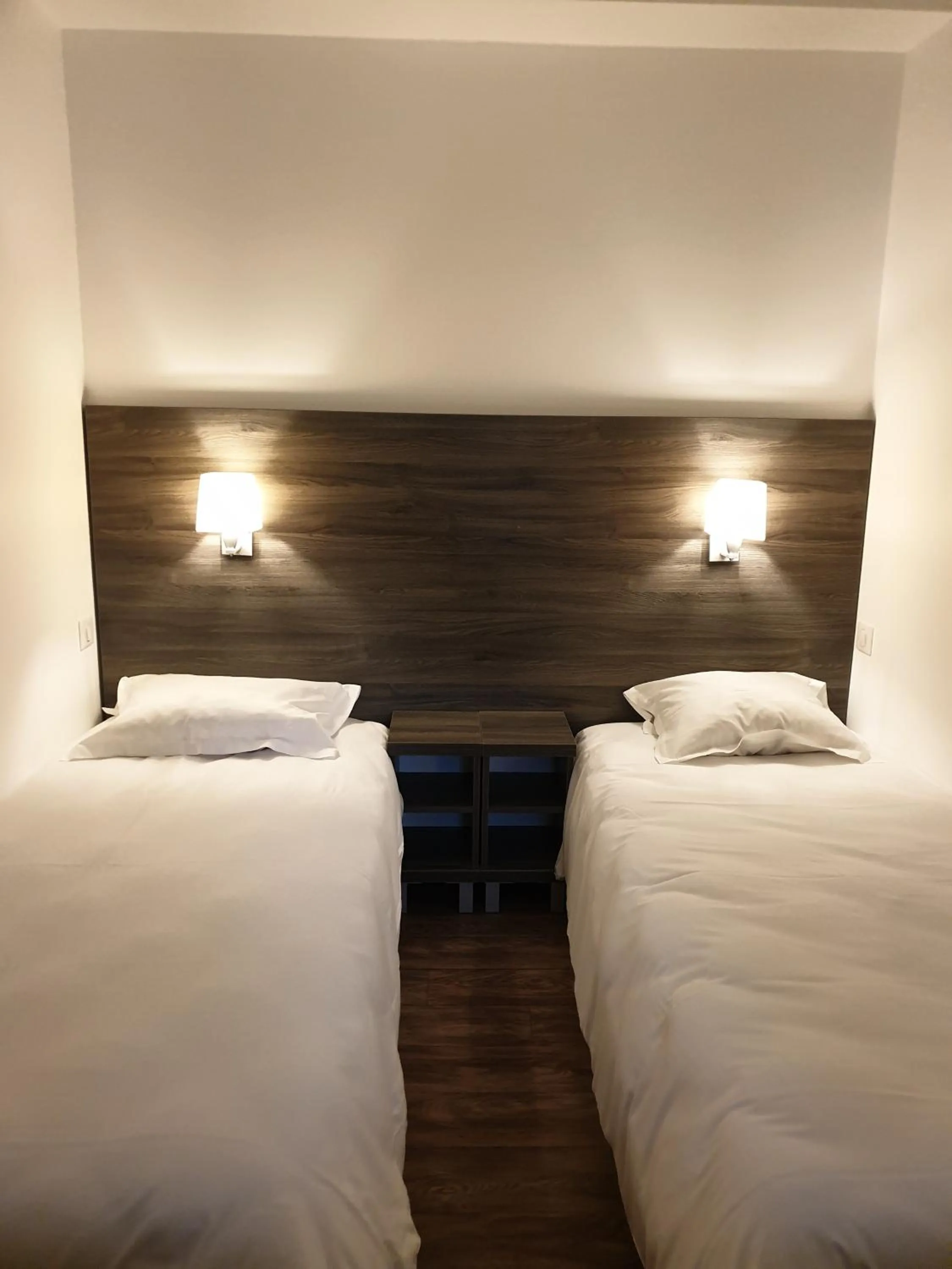 Bed in Logis Hotel des Portes de Meuse