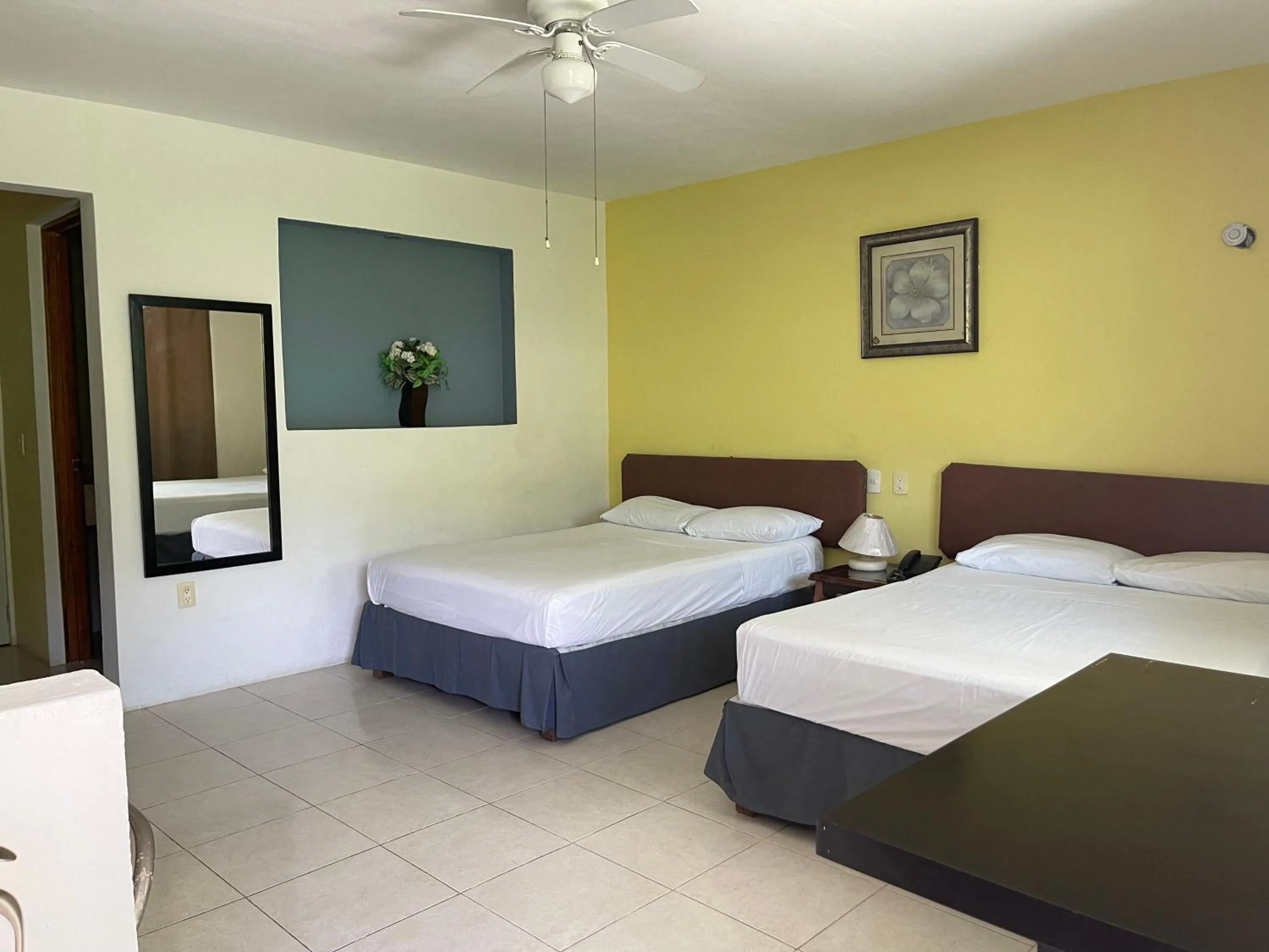 Bed in Hotel Villa Escondida Campeche