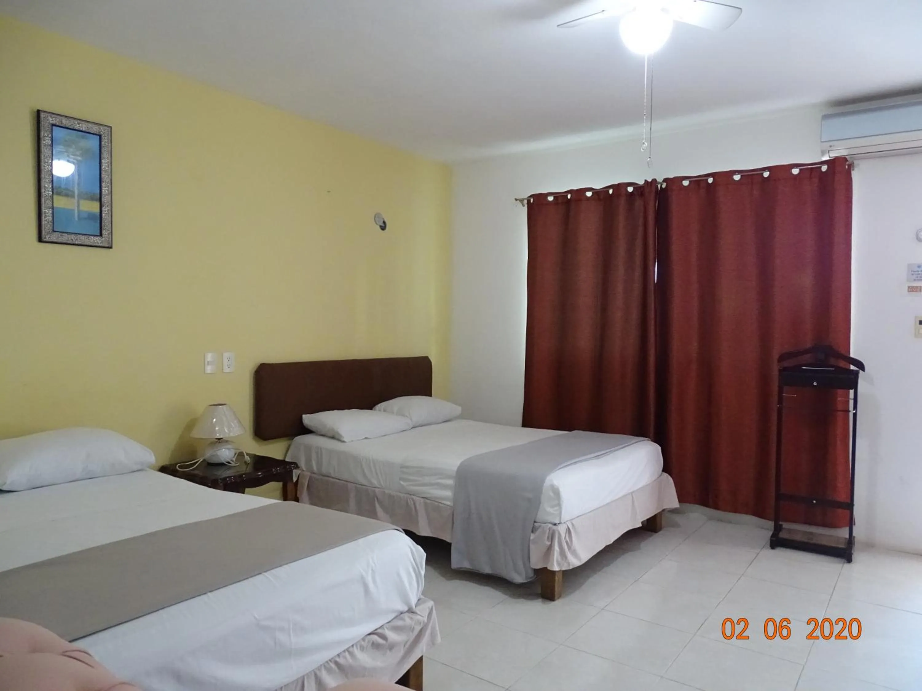Bed in Hotel Villa Escondida Campeche