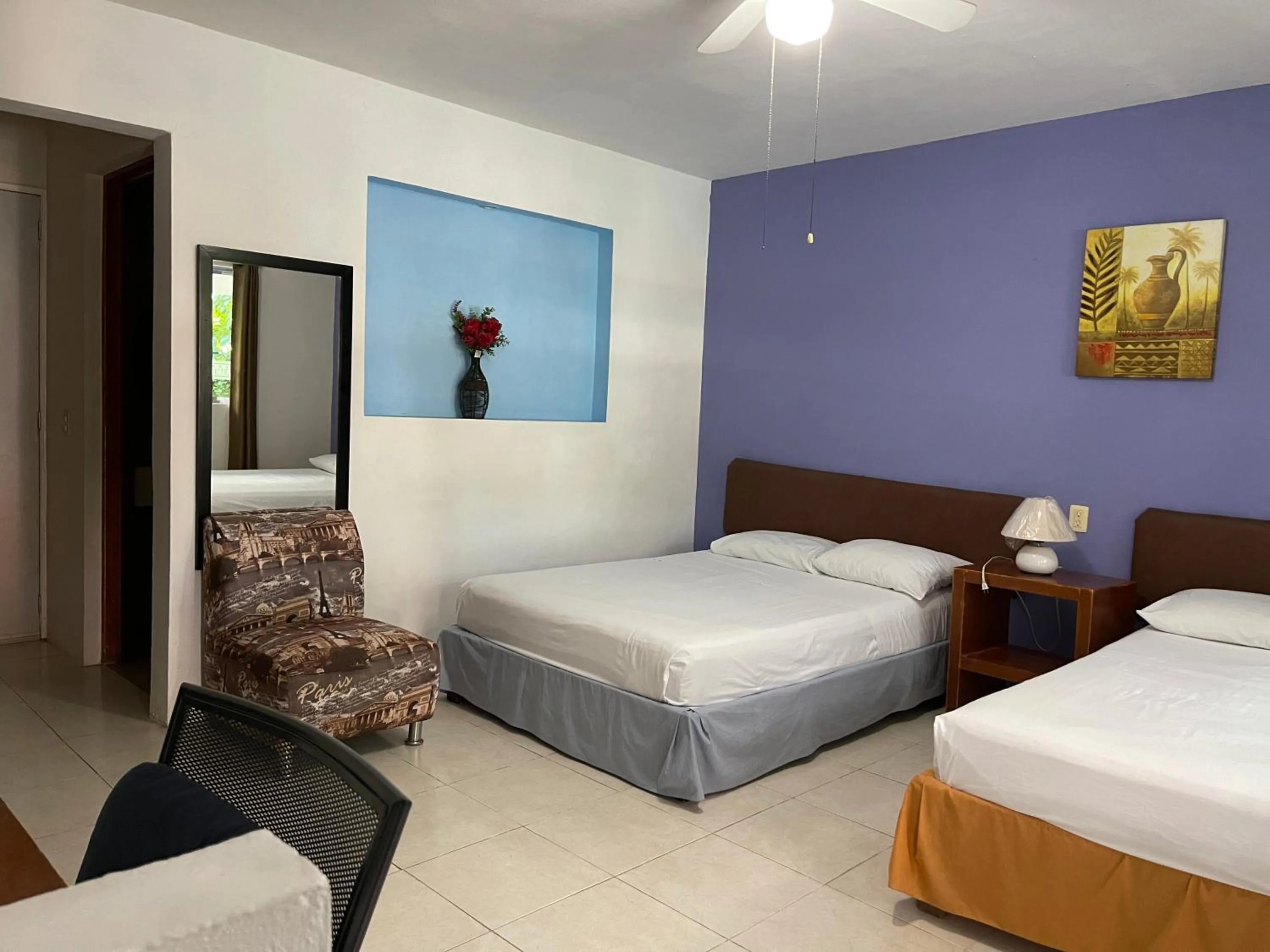 Bed in Hotel Villa Escondida Campeche