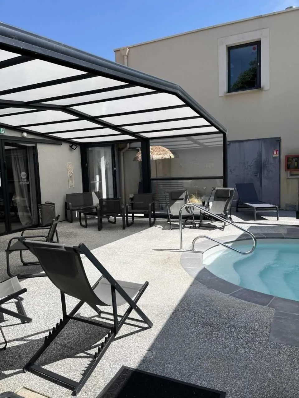 Swimming pool in Hotel Best Western La Mare Ô Poissons