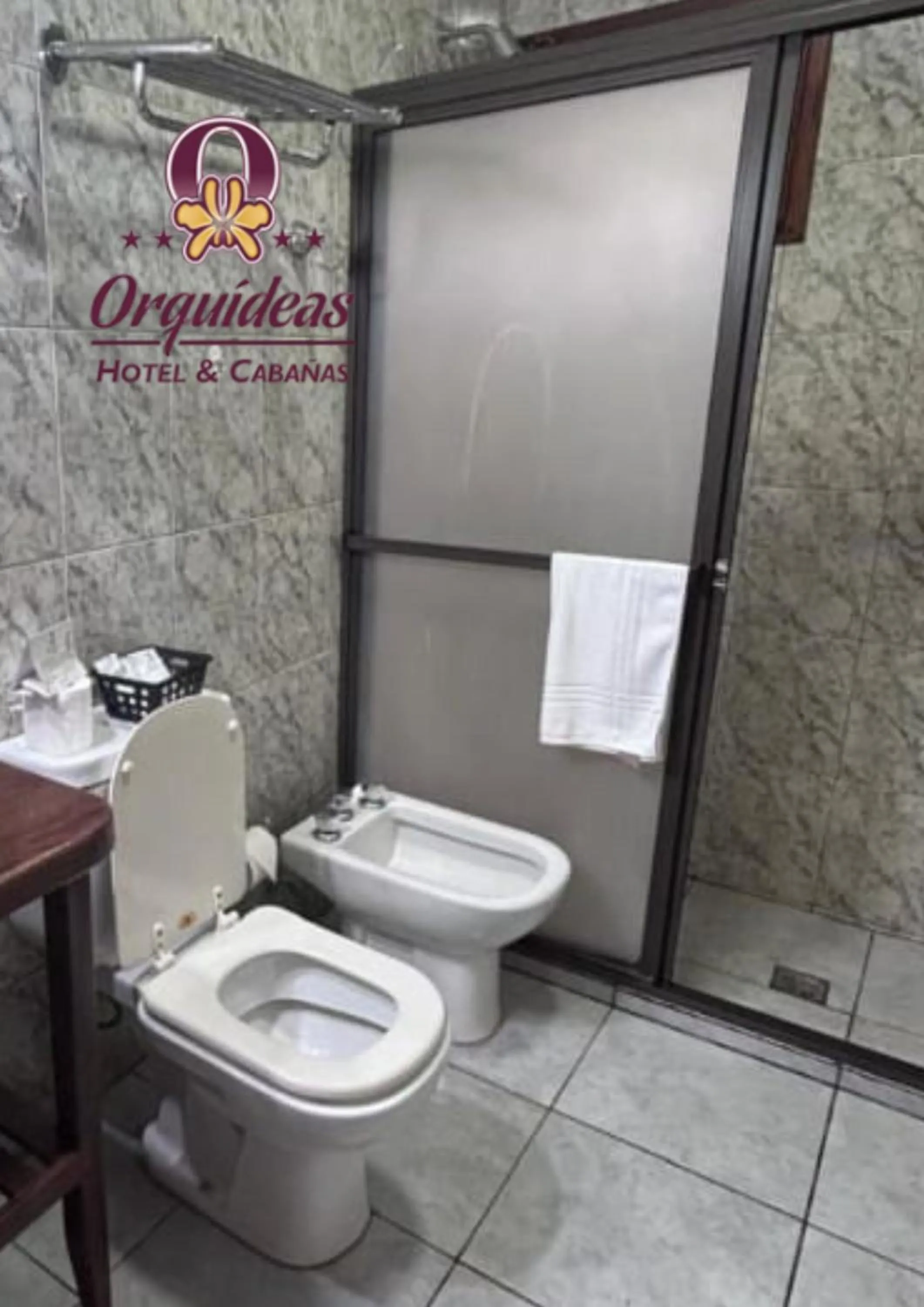 Toilet in Orquideas Hotel & Cabañas