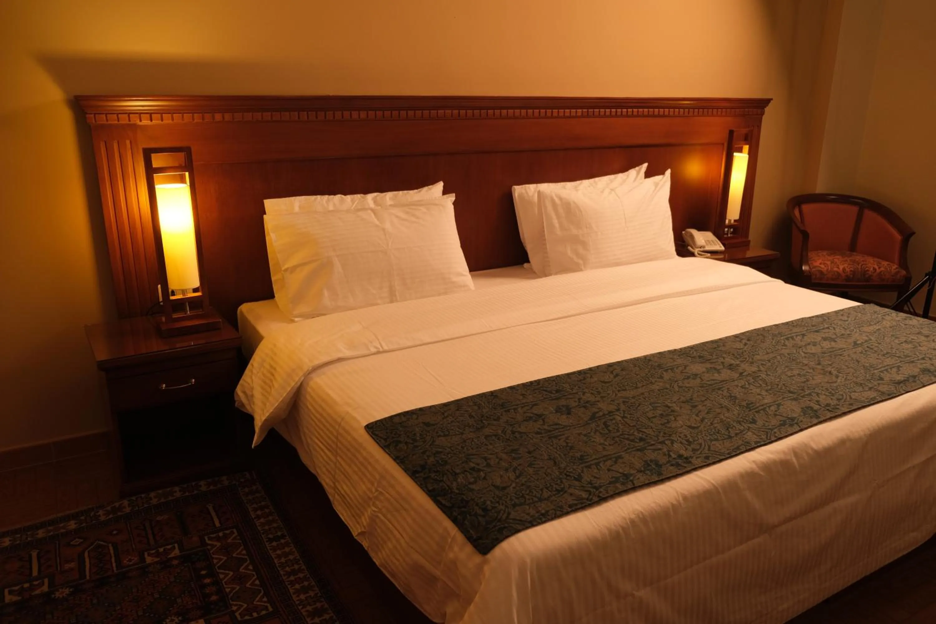 Bed in Le Cedrus Hotel