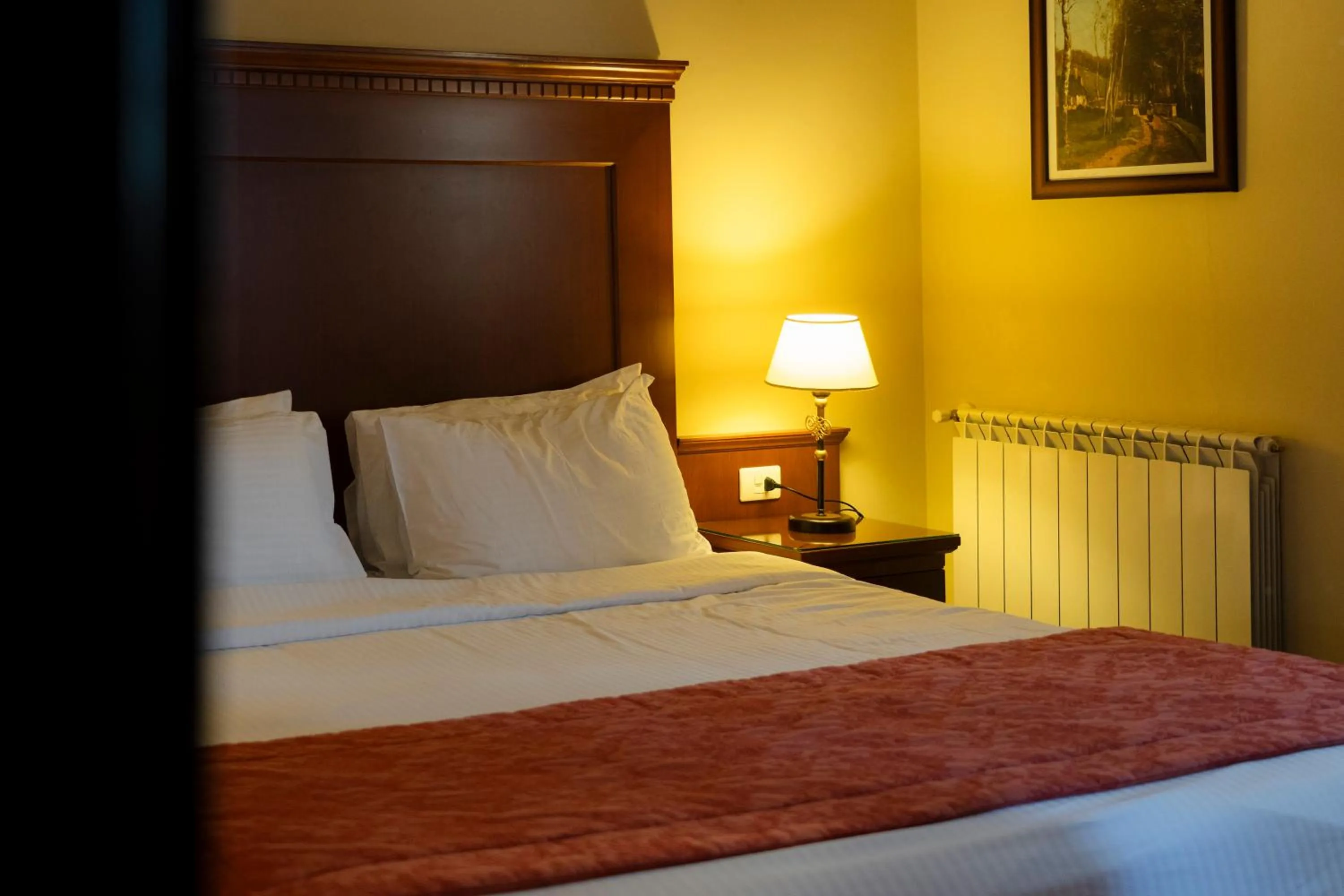 Bed in Le Cedrus Hotel