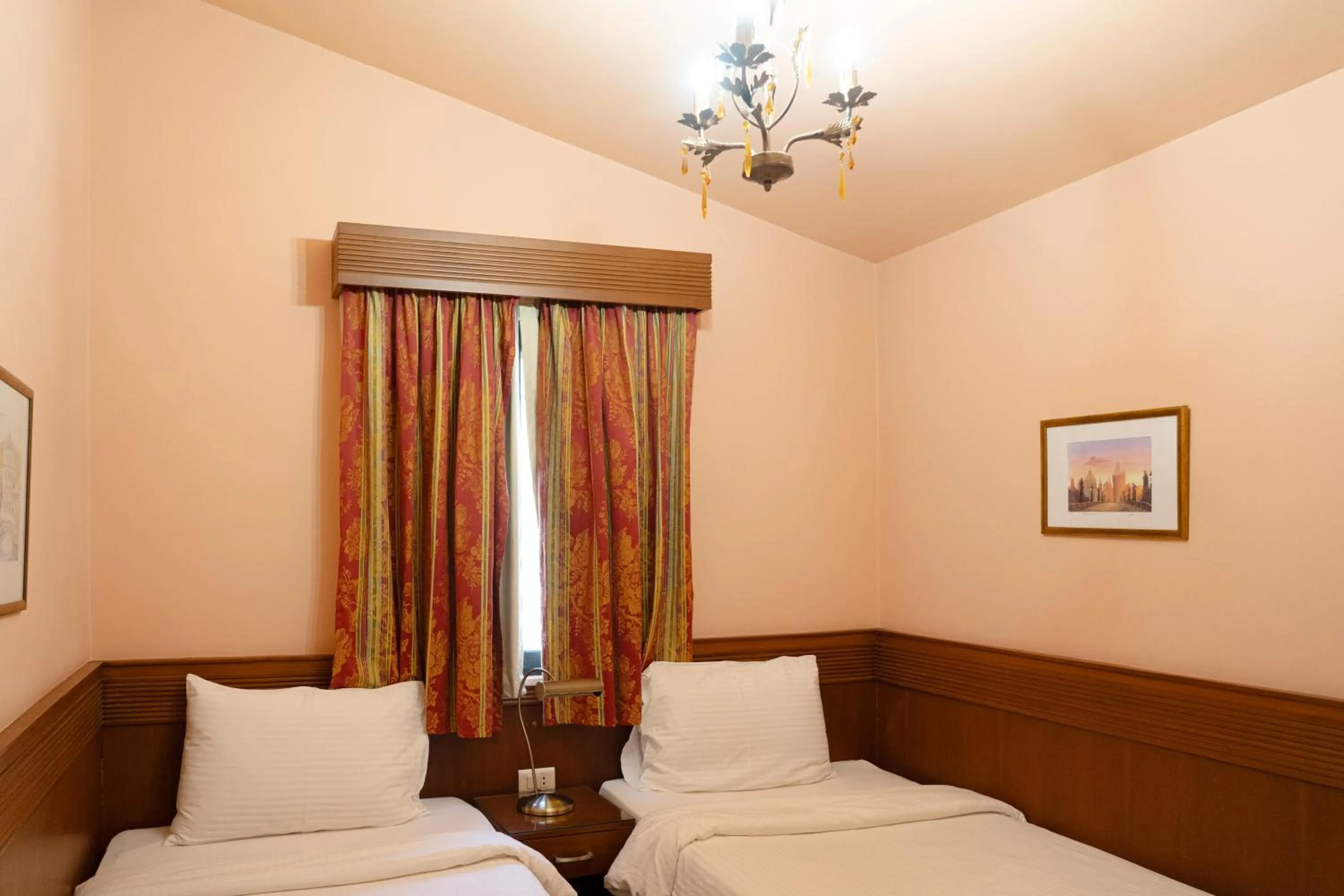 Bed in Le Cedrus Hotel