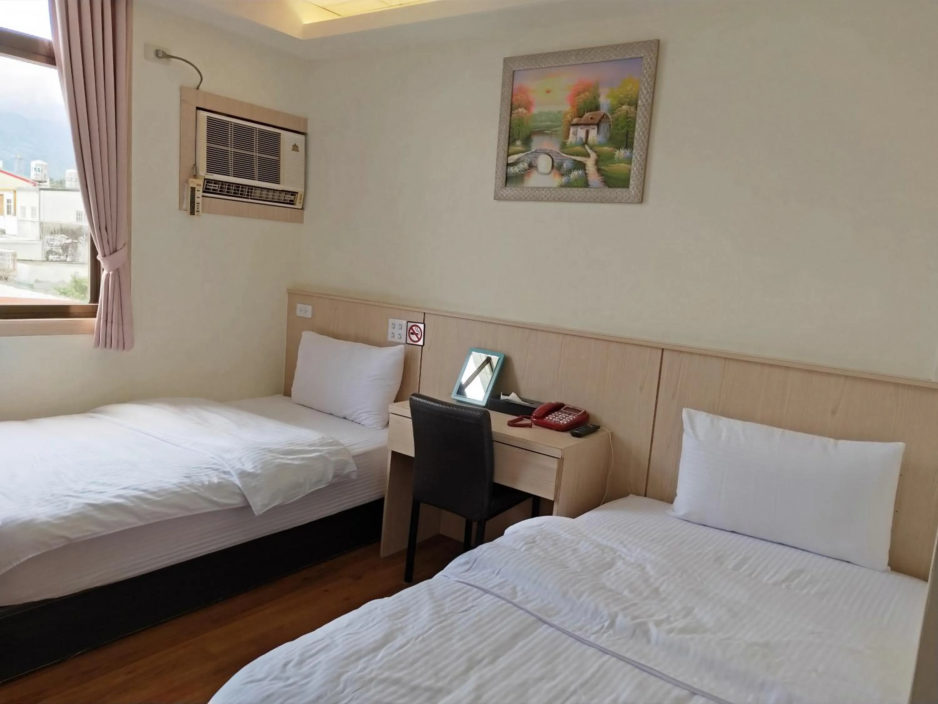 Bed in Oriental Hotel