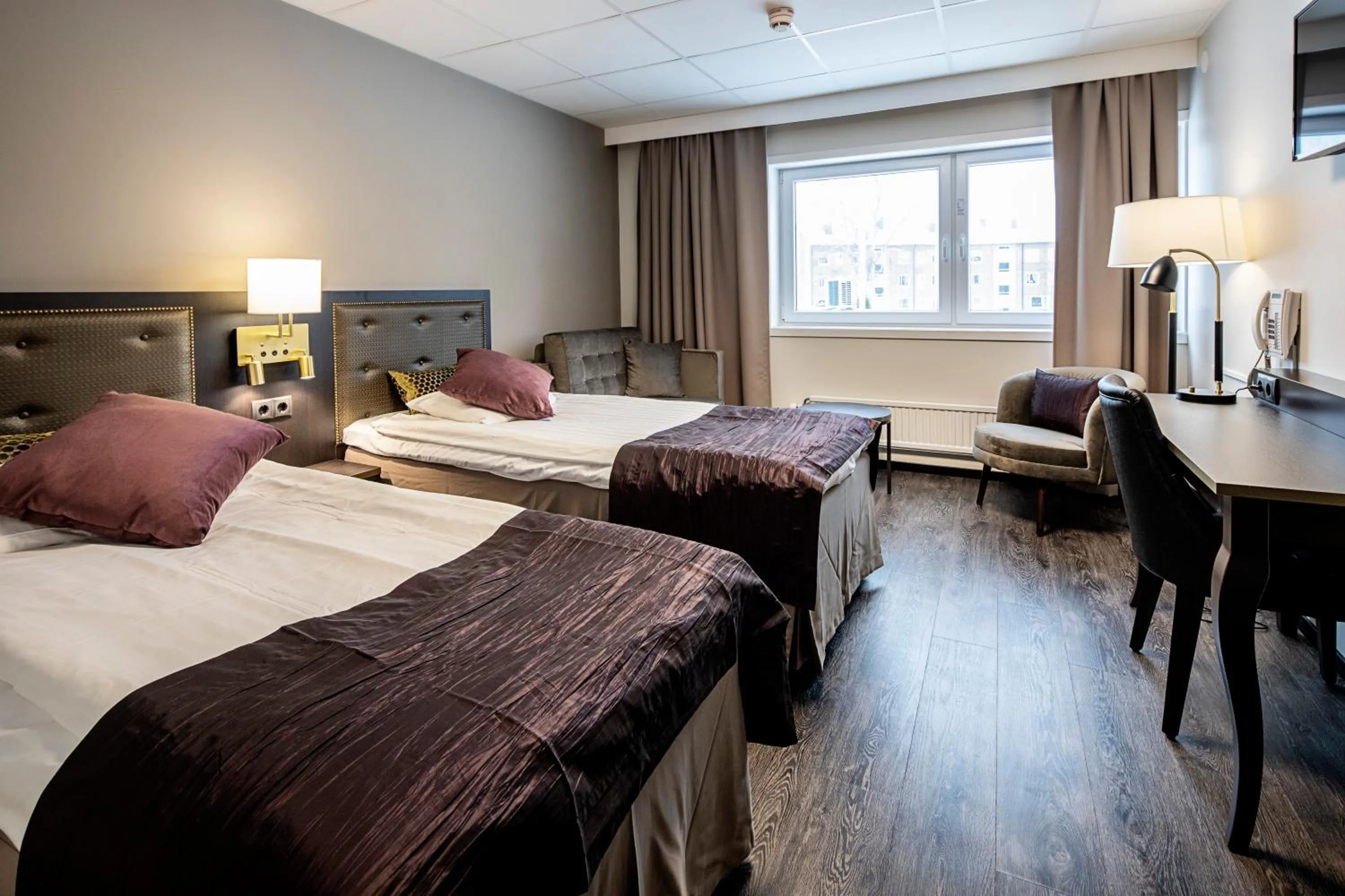 Bed in First Hotel Royal