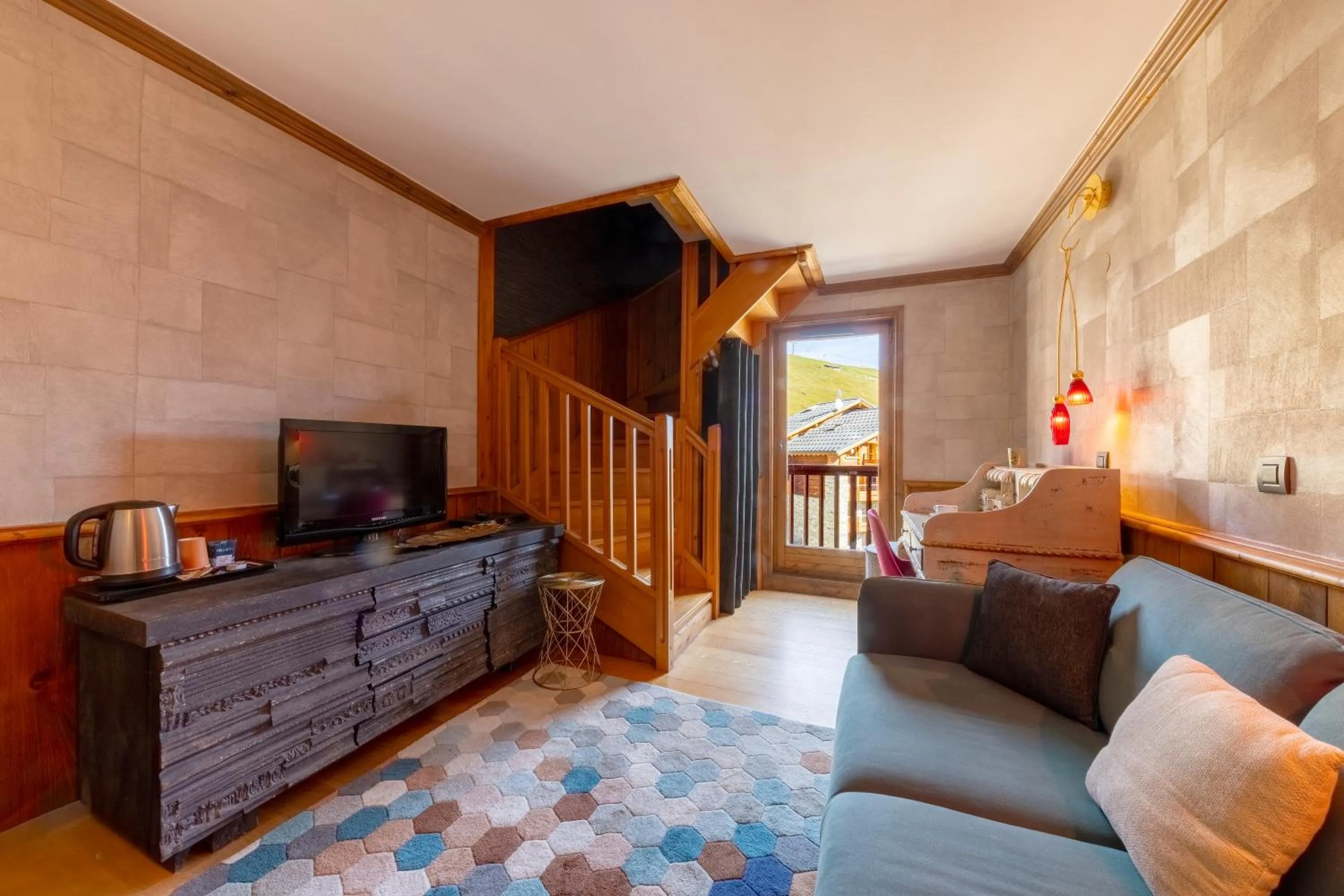 Seating area in Hôtel Village Montana by Les Etincelles