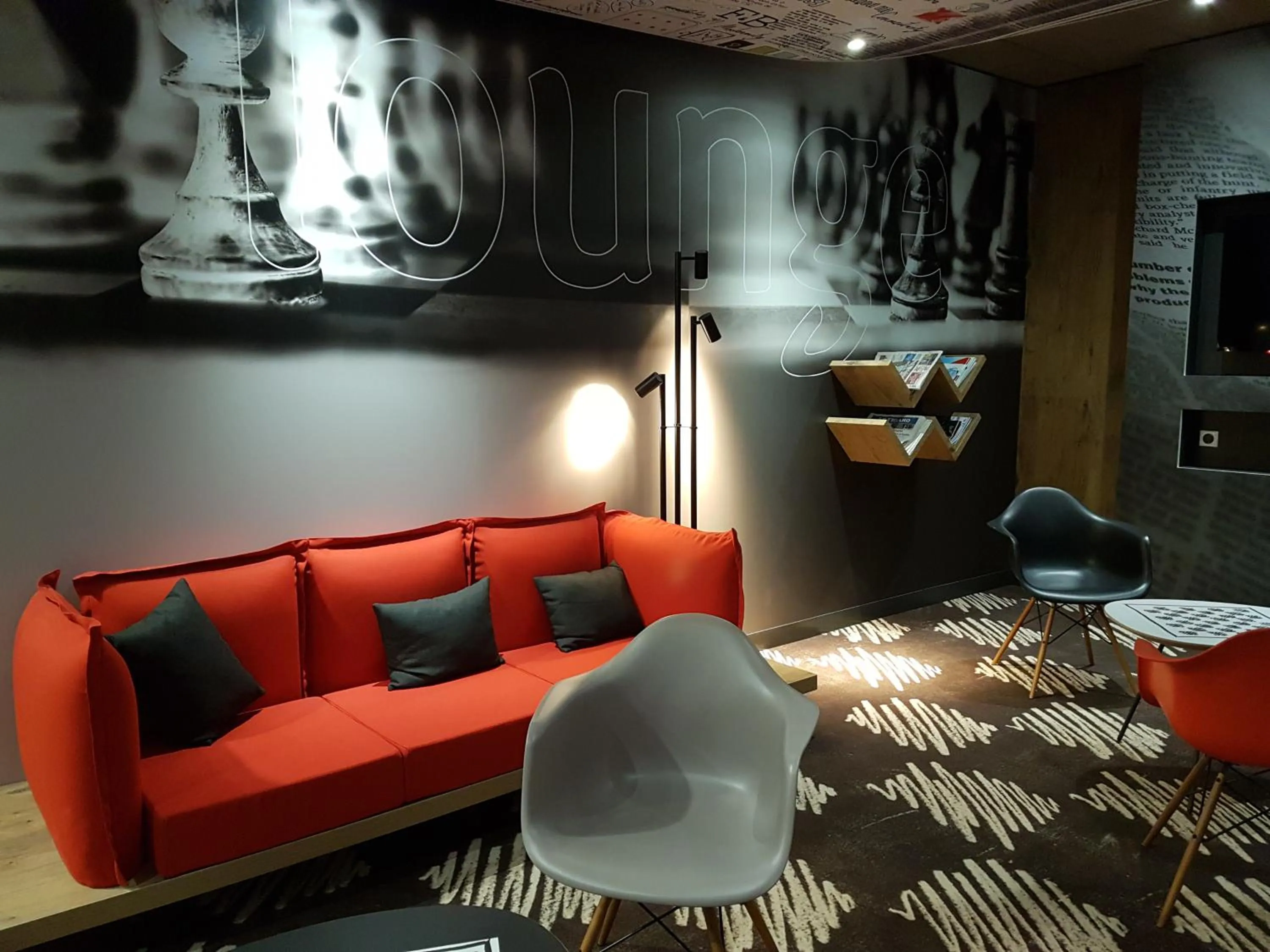 Communal lounge/ TV room in ibis Saint-Die