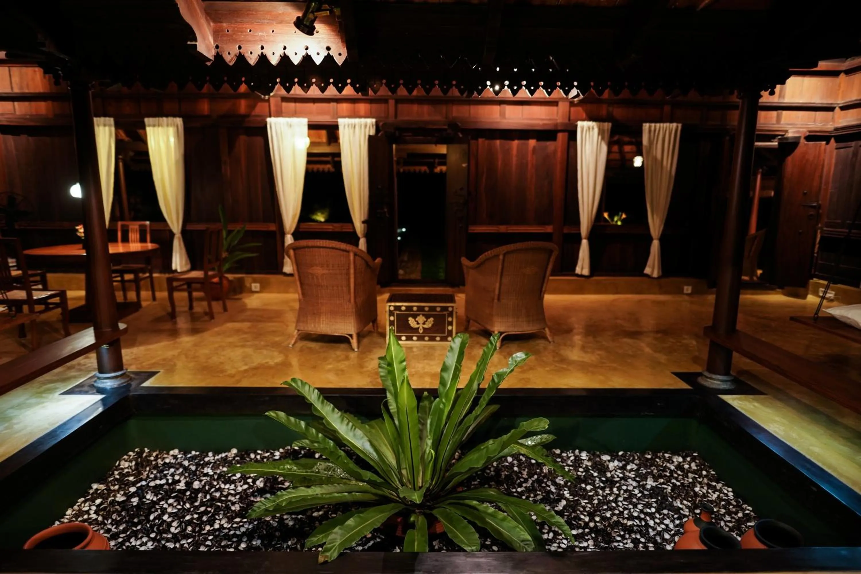 Living room in Vismaya by Moksha Stays