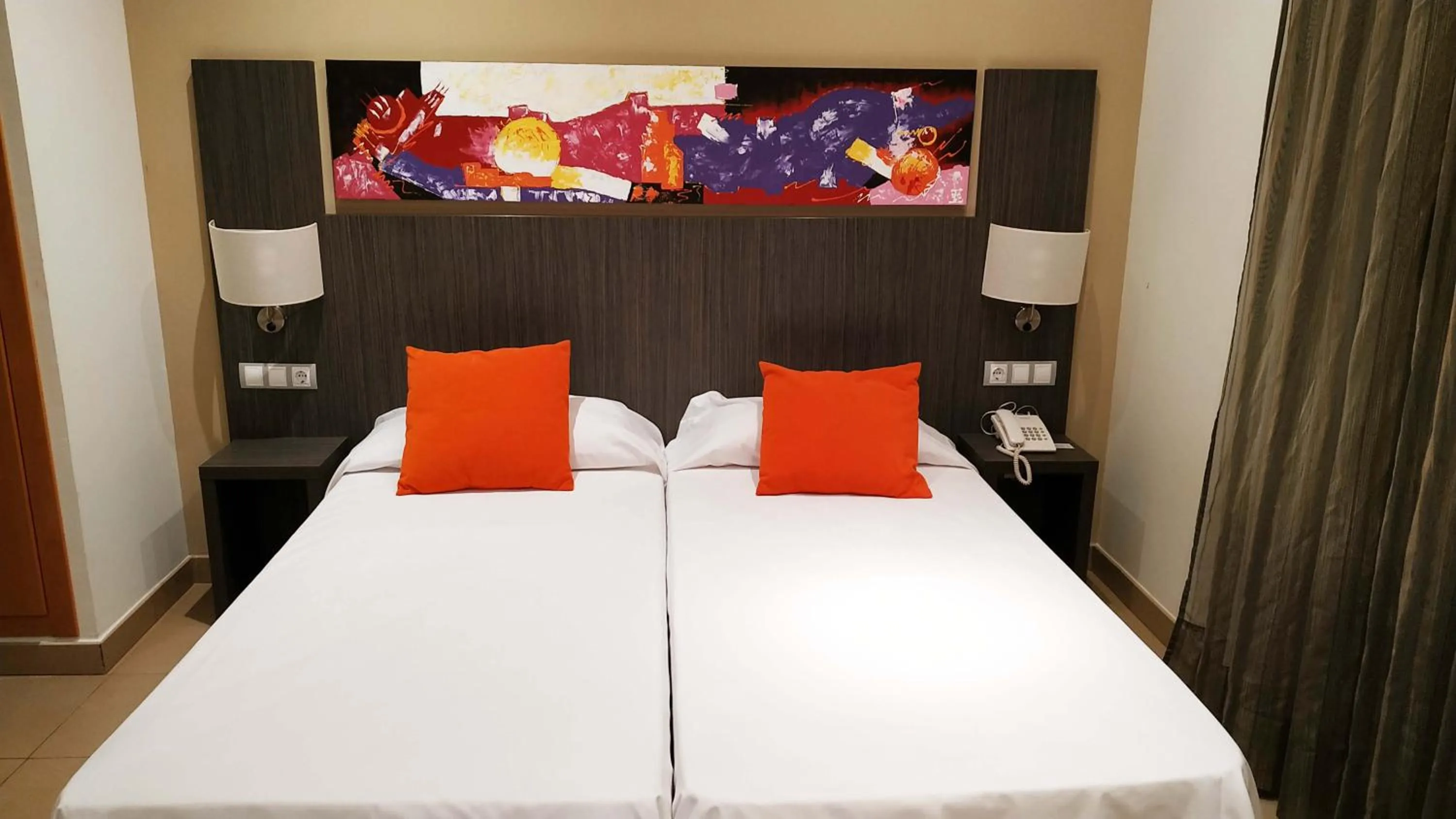 Bed in Alcocebre Suites Hotel