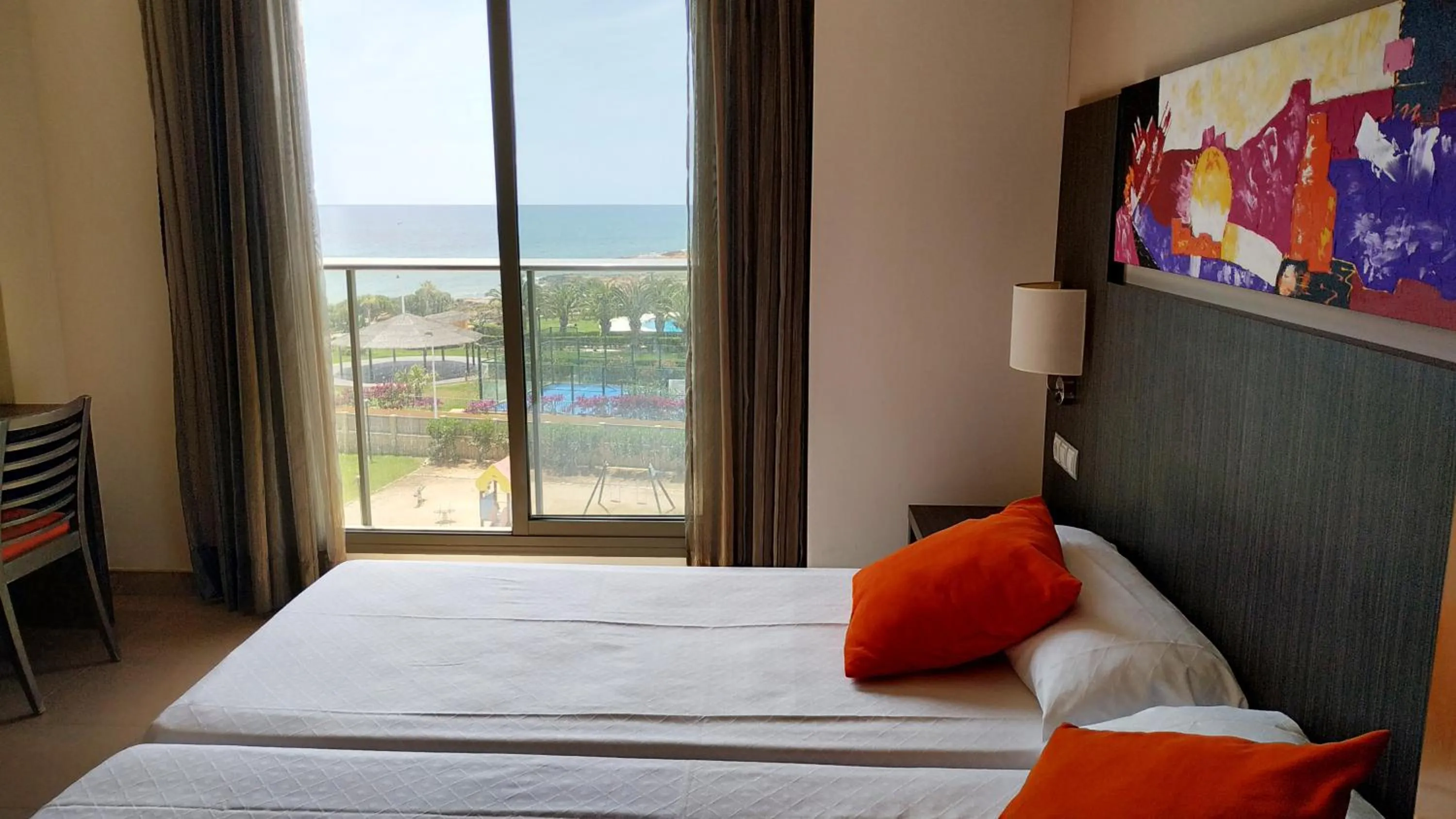 Bed in Alcocebre Suites Hotel