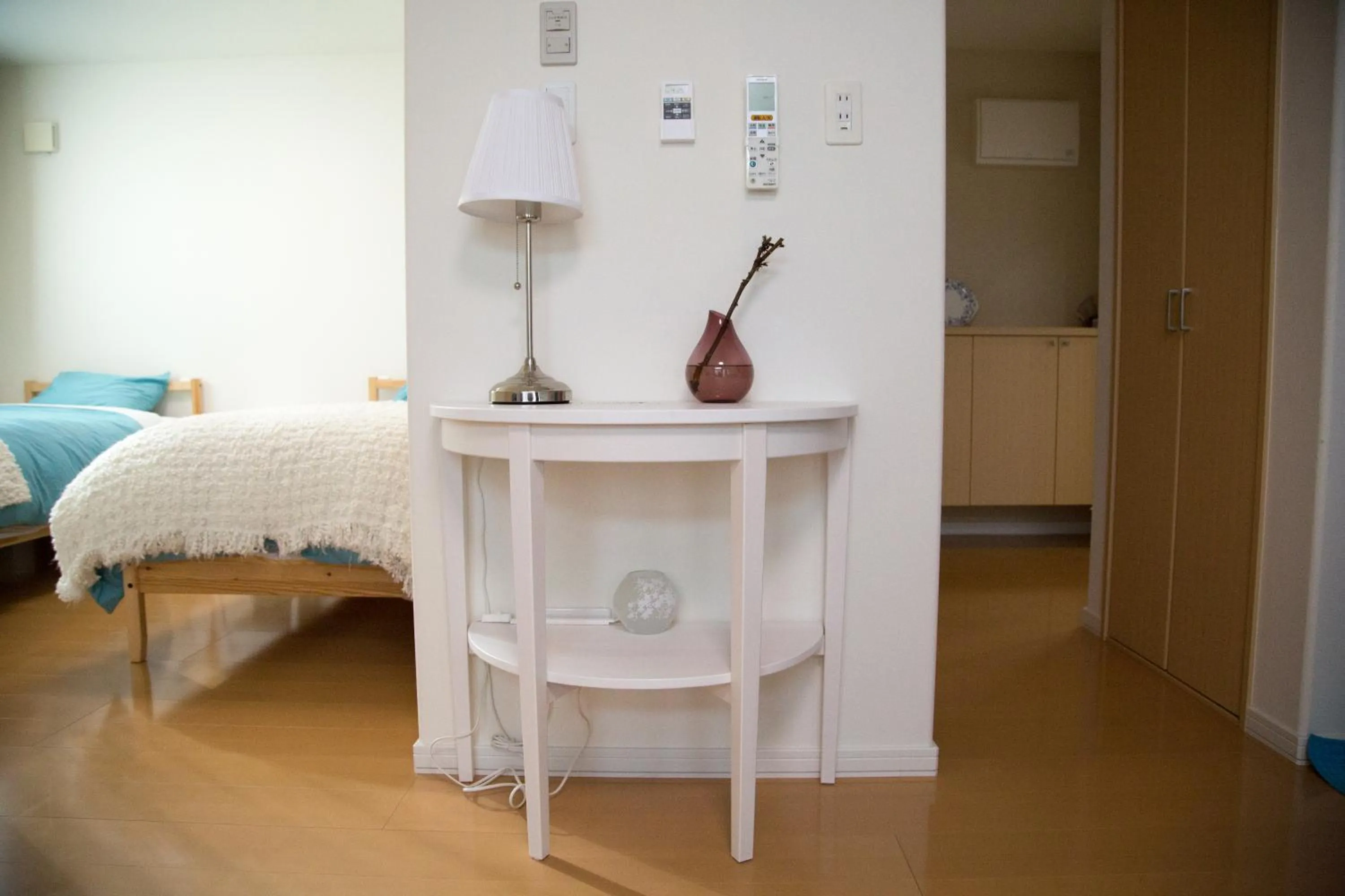 Living room, Bed in Villa Sapporo Honobono