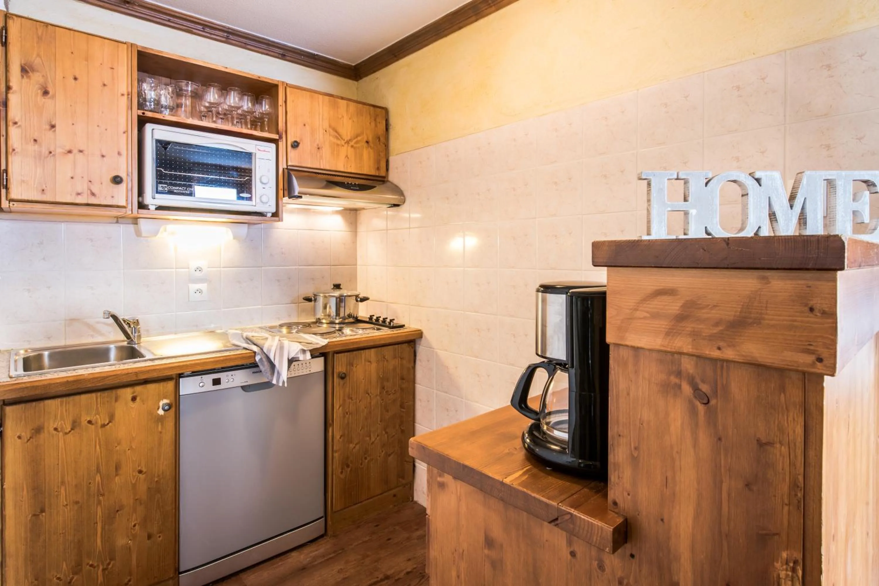 Kitchen or kitchenette in Résidences Village Montana by Les Etincelles