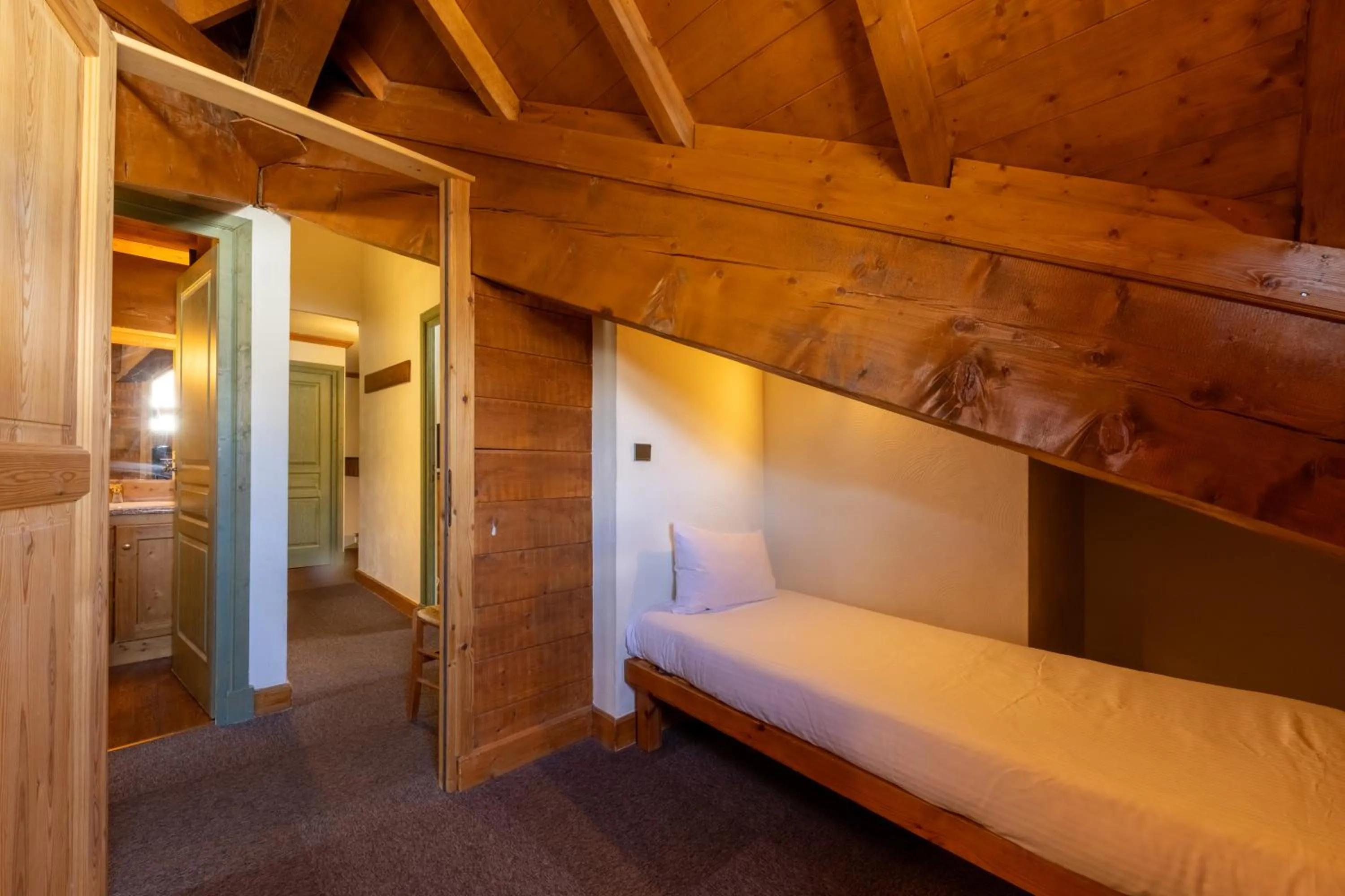 Bed in Résidences Village Montana by Les Etincelles