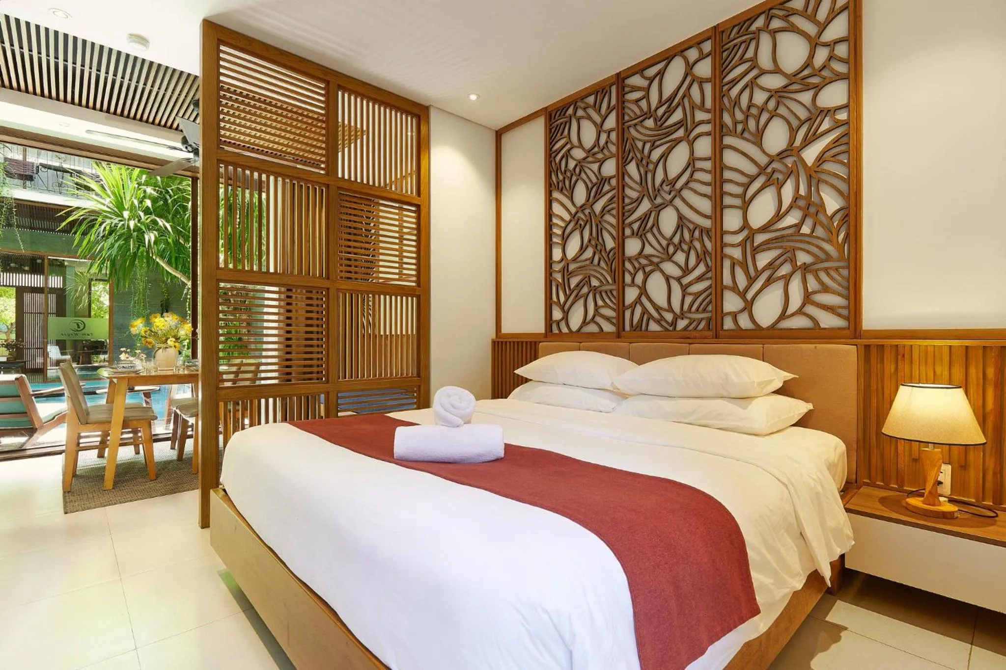 Bed in Tam House Villa Hotel
