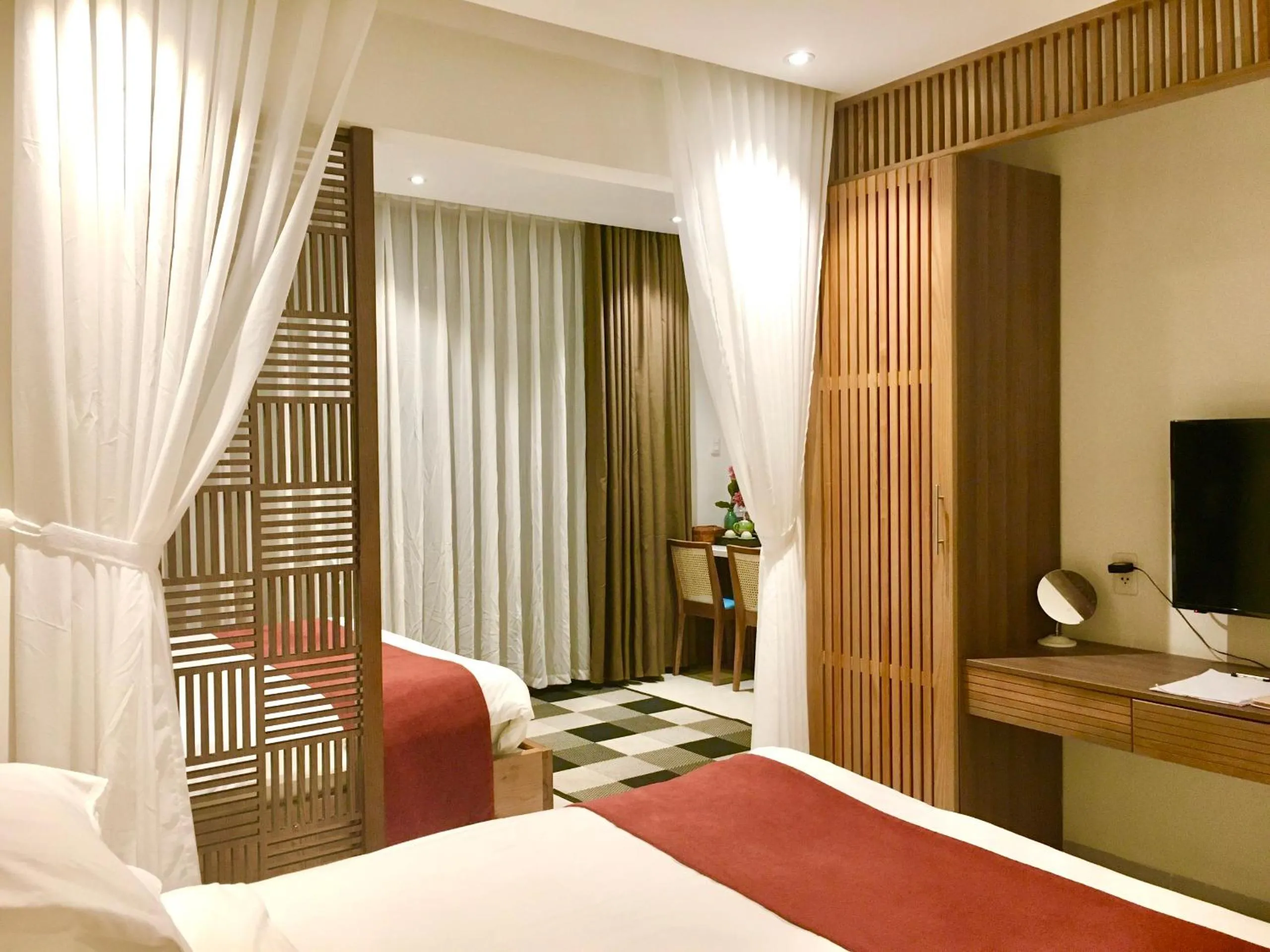 Bed in Tam House Villa Hotel