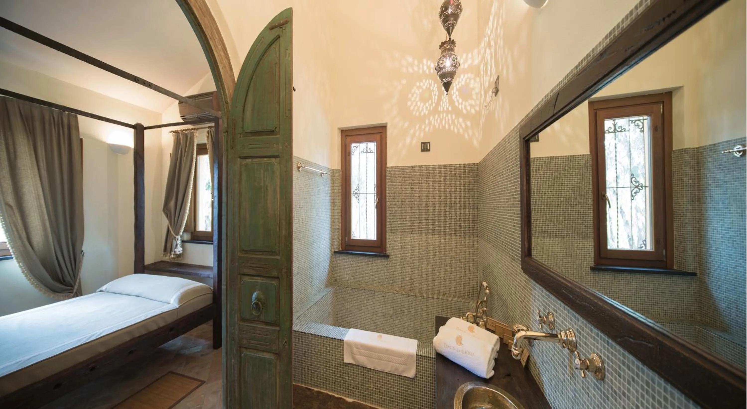 Bed in Resort La Ghiaia