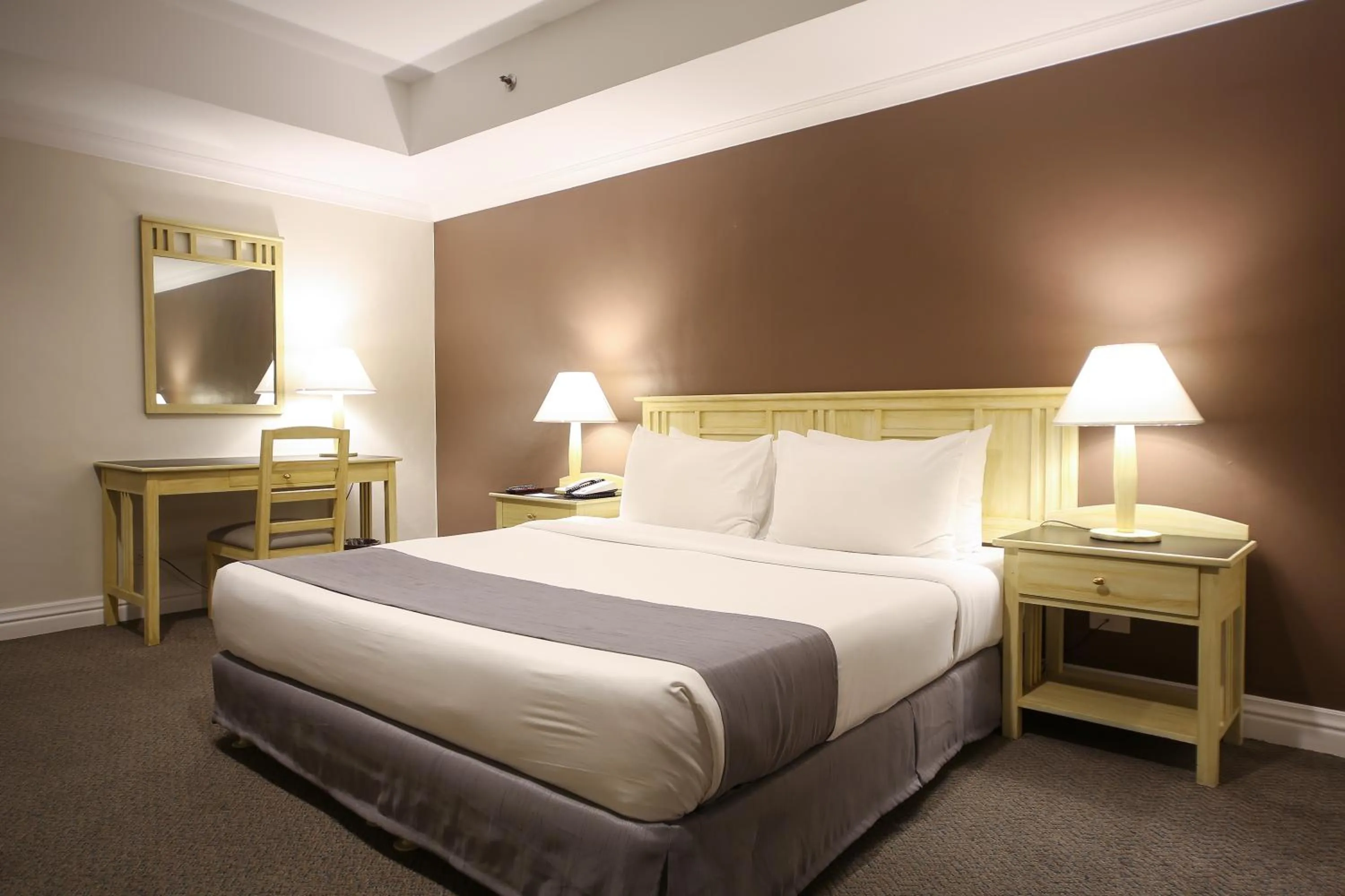 Bedroom in Infinity Tower Suites