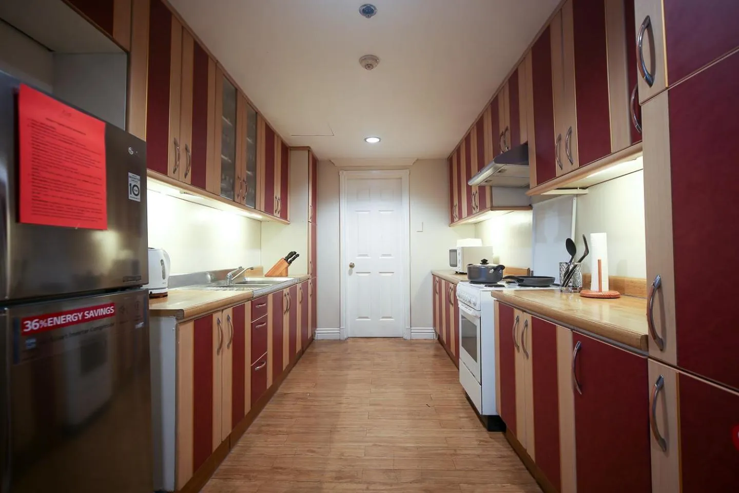 Kitchen or kitchenette in Infinity Tower Suites