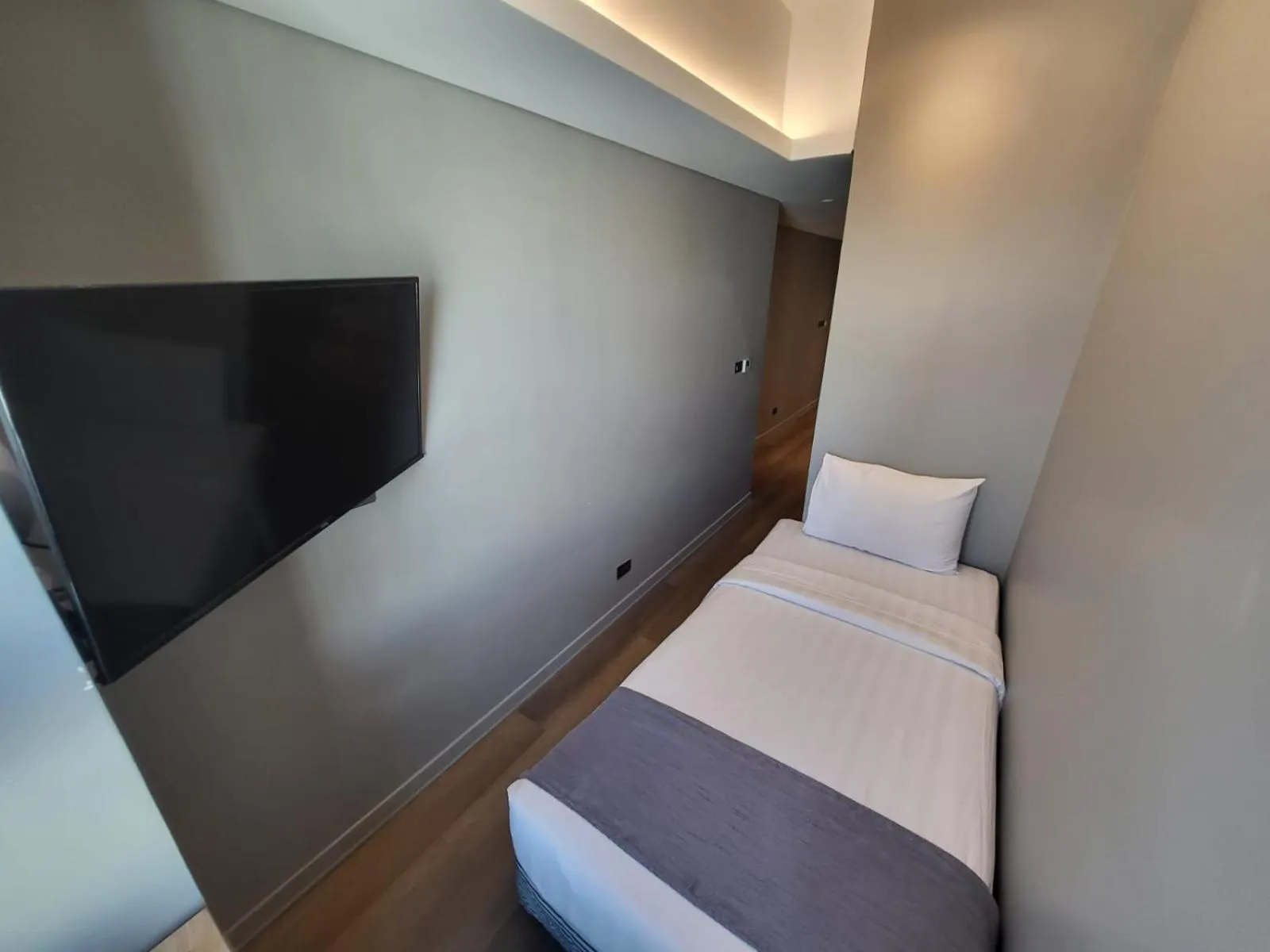 Bedroom in Infinity Tower Suites