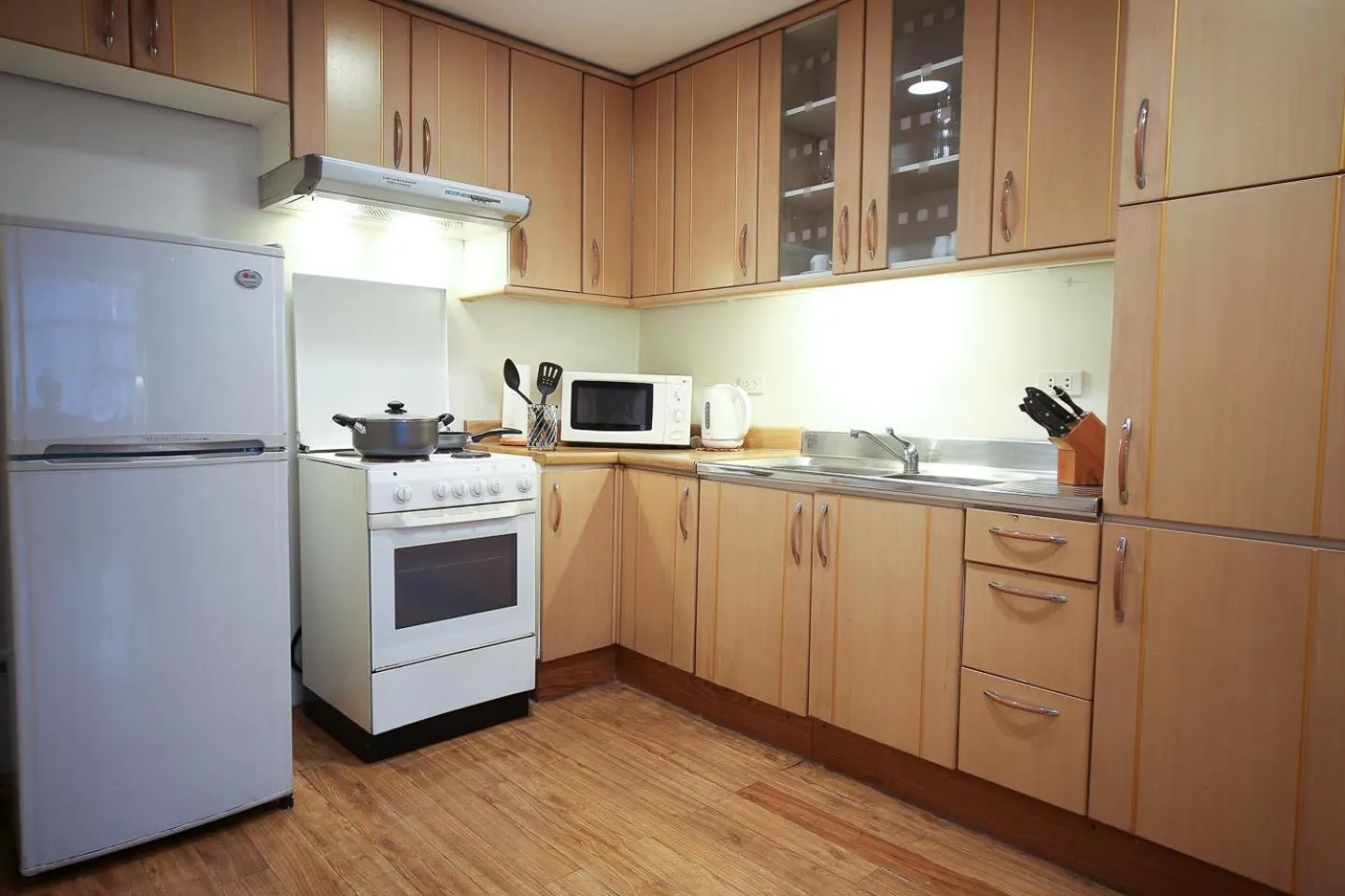 Kitchen or kitchenette in Infinity Tower Suites