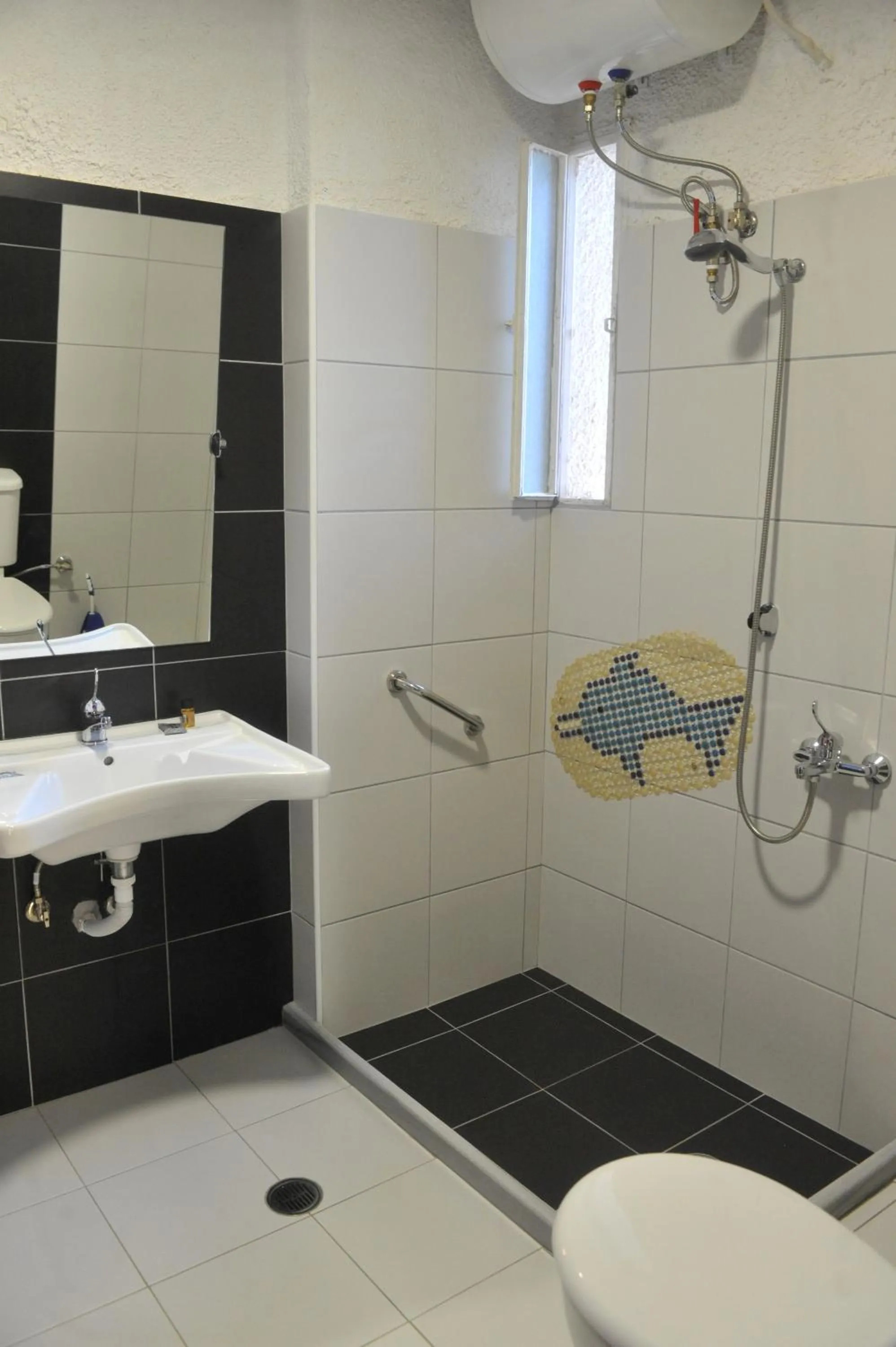 Shower in Chaliotis Apartments