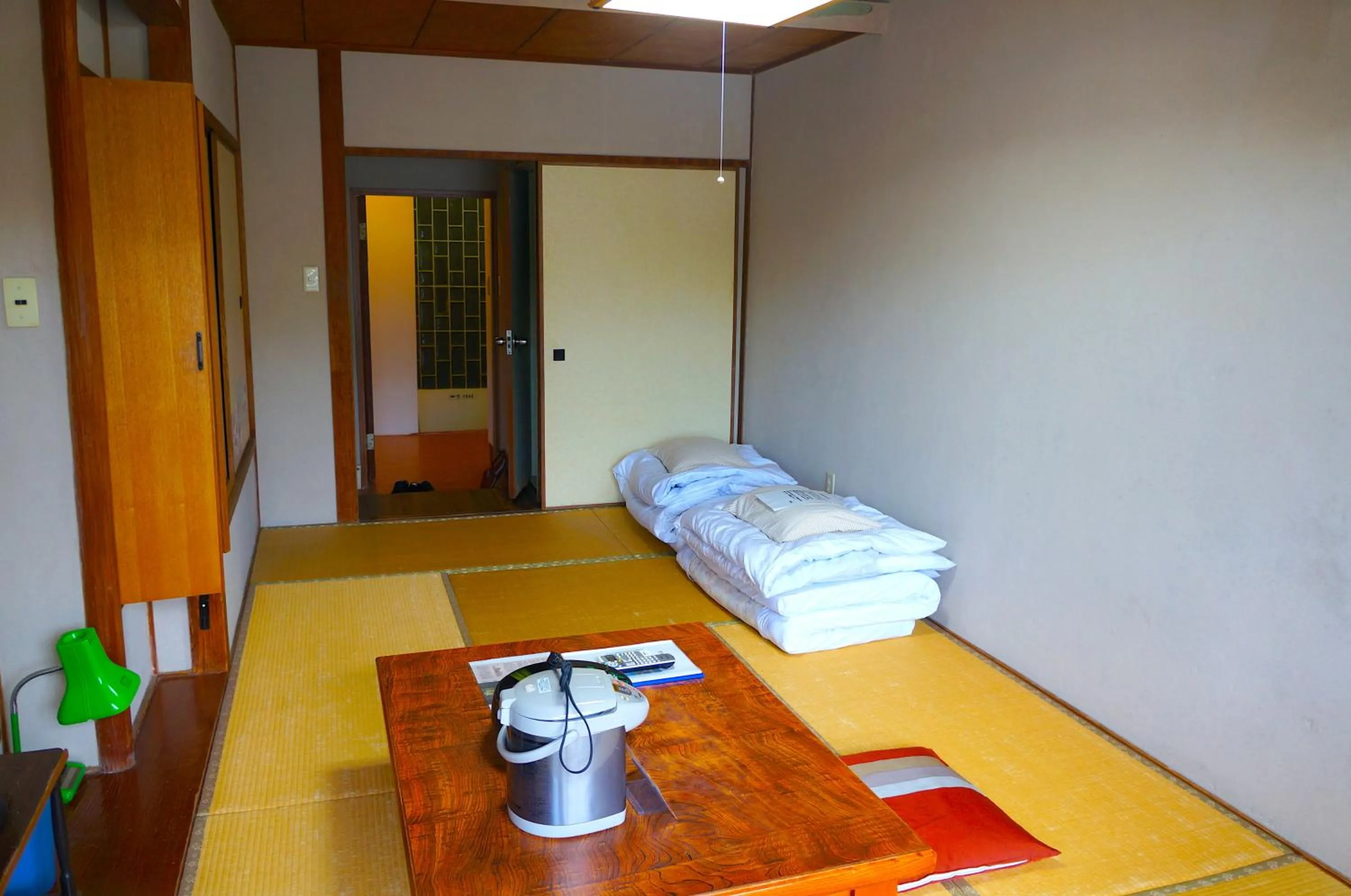 Bed in Hotel Yakushima Sanso