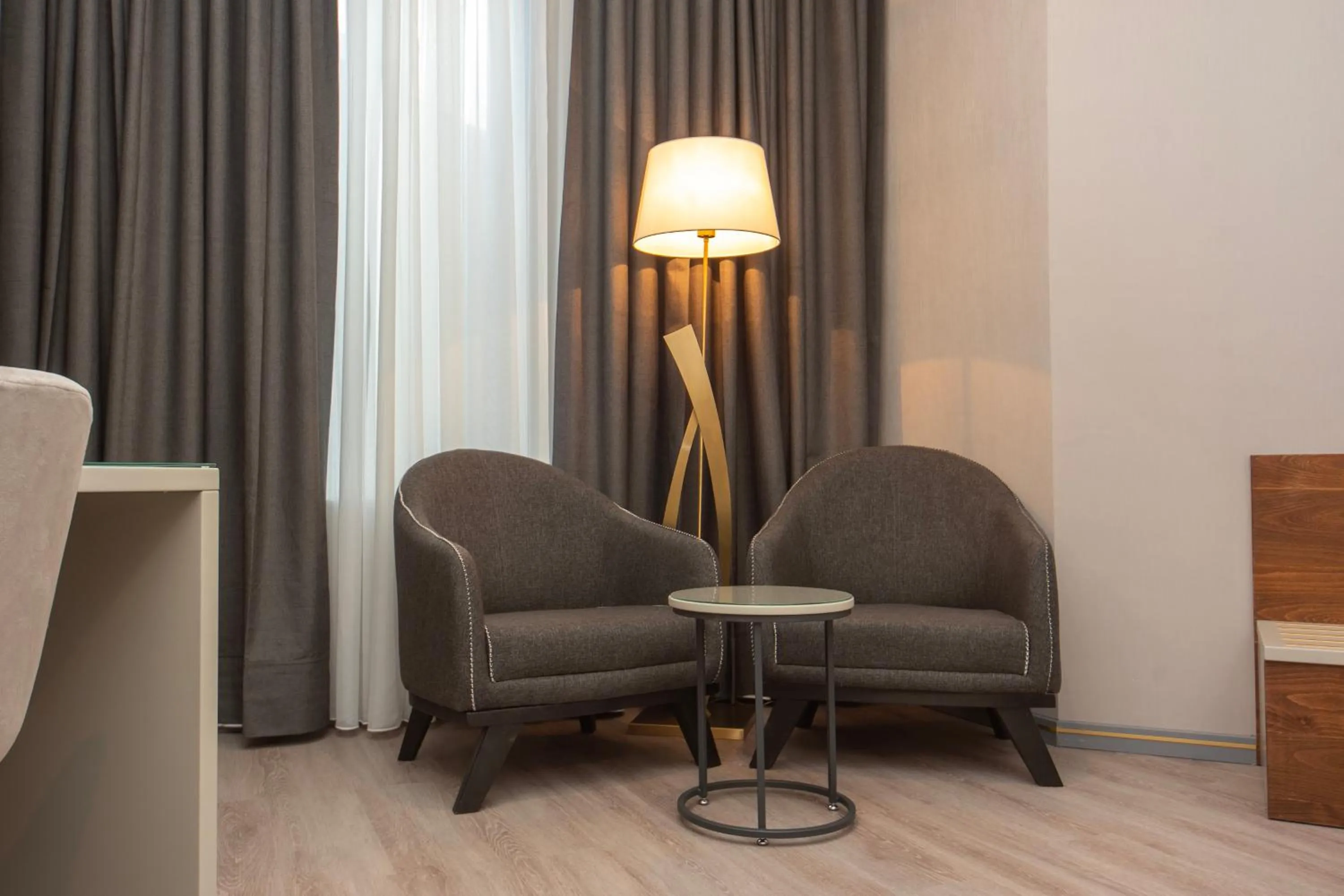 Seating area in Tbilisi Chambers, Trademark Collection by Wyndham