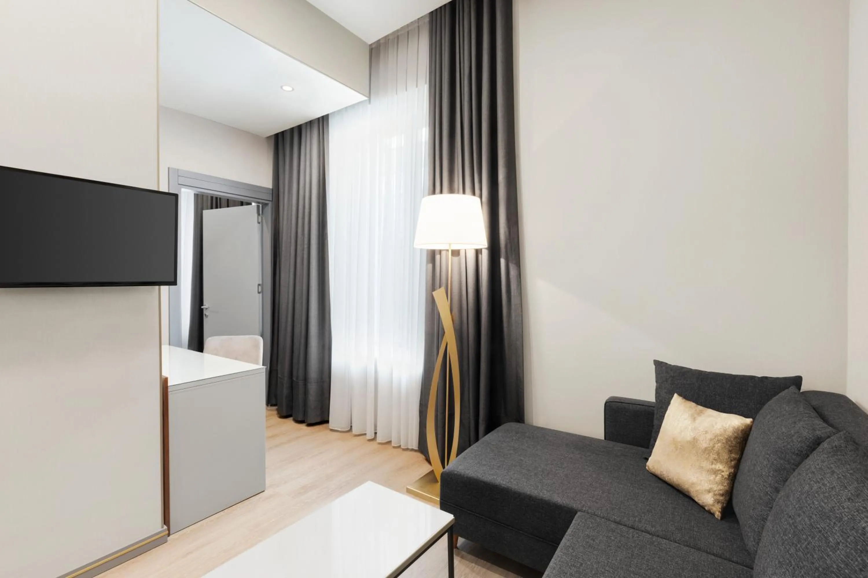 Seating area in Tbilisi Chambers, Trademark Collection by Wyndham