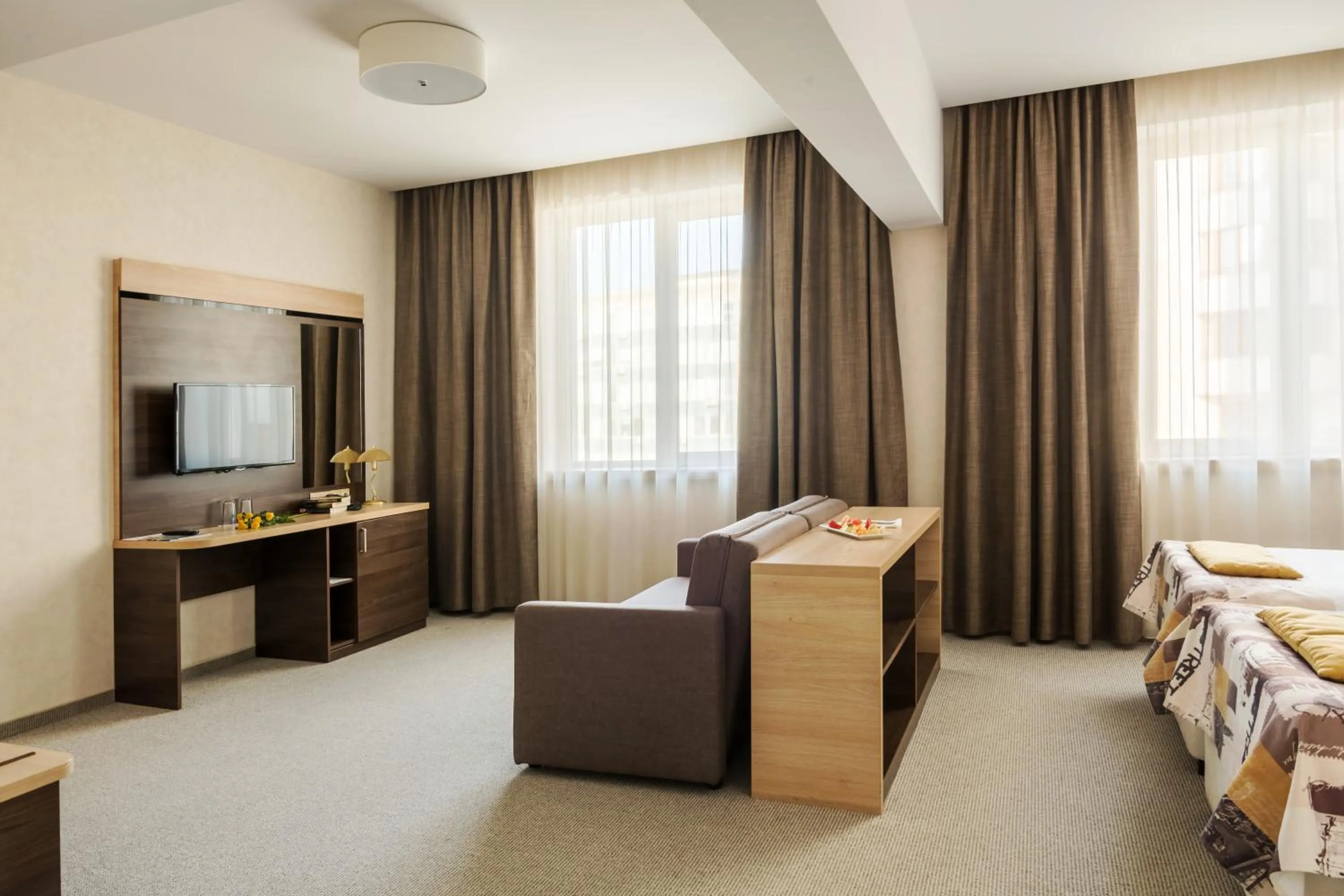 Seating area, Bed in Dunav Plaza Hotel