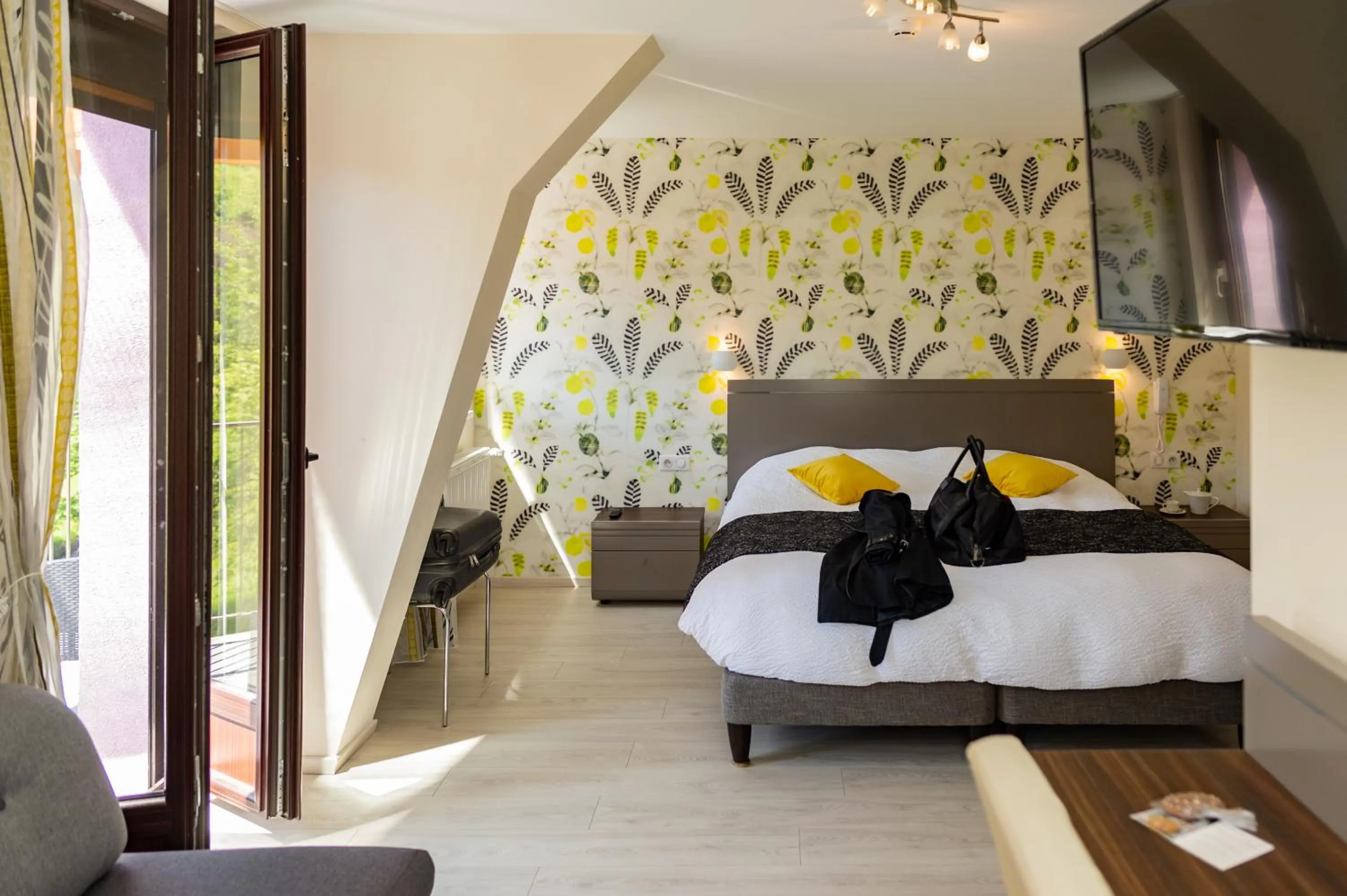 Bed in Logis Hotel Des Vosges