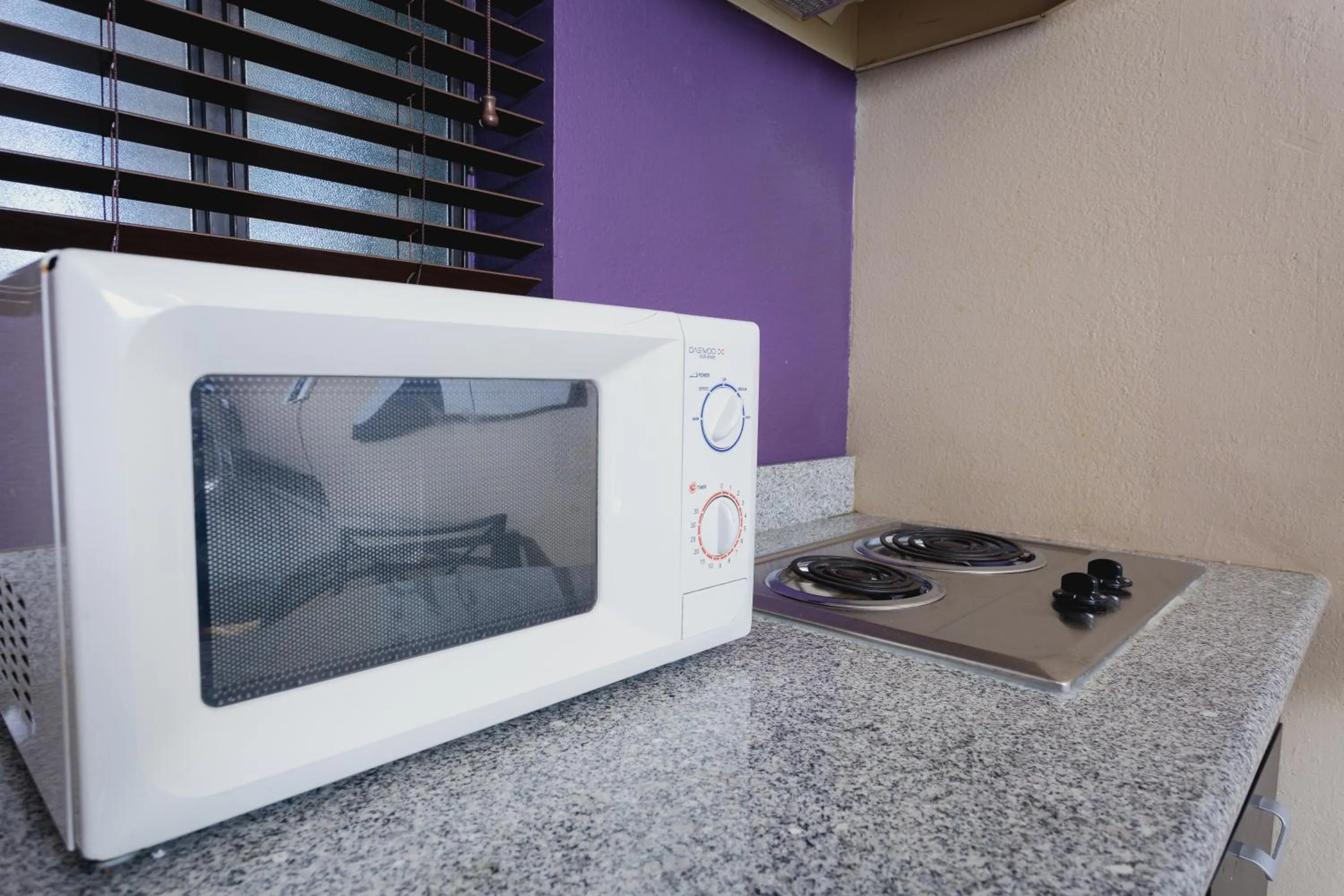 Kitchen or kitchenette in Alura Inn