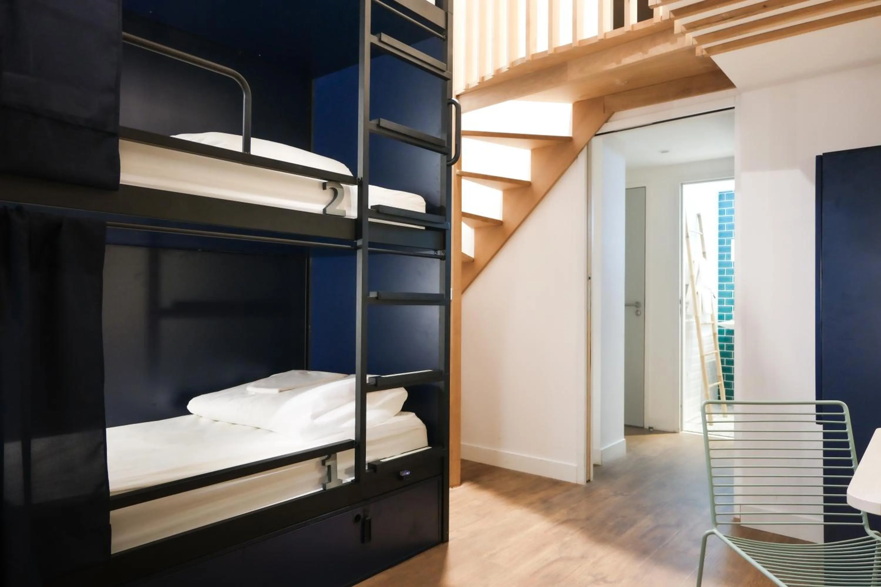 Photo of the whole room, Bed in Hotel The Playce by Happyculture