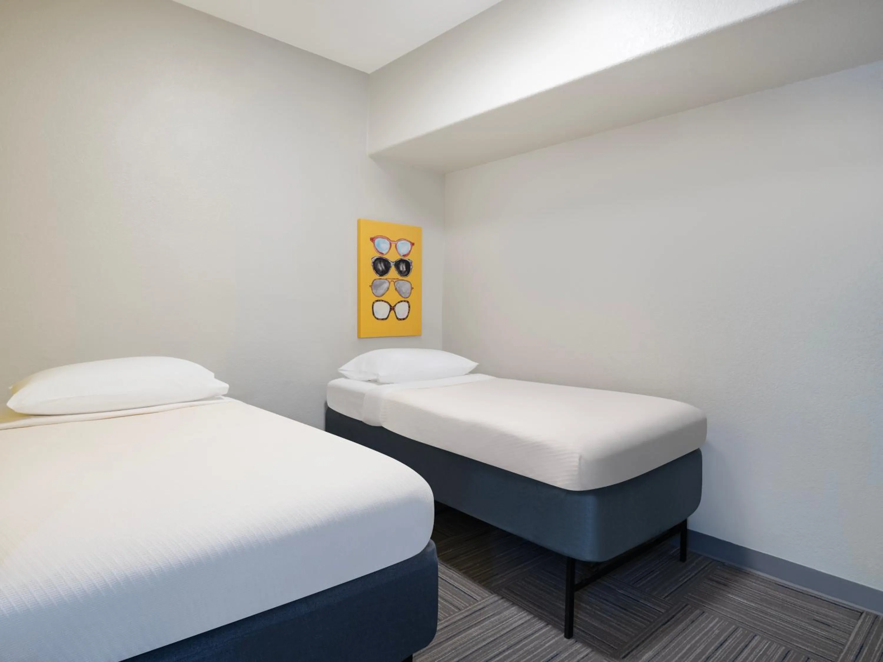 Bedroom, Bed in Holiday Inn Resort Orlando Suites - Waterpark by IHG