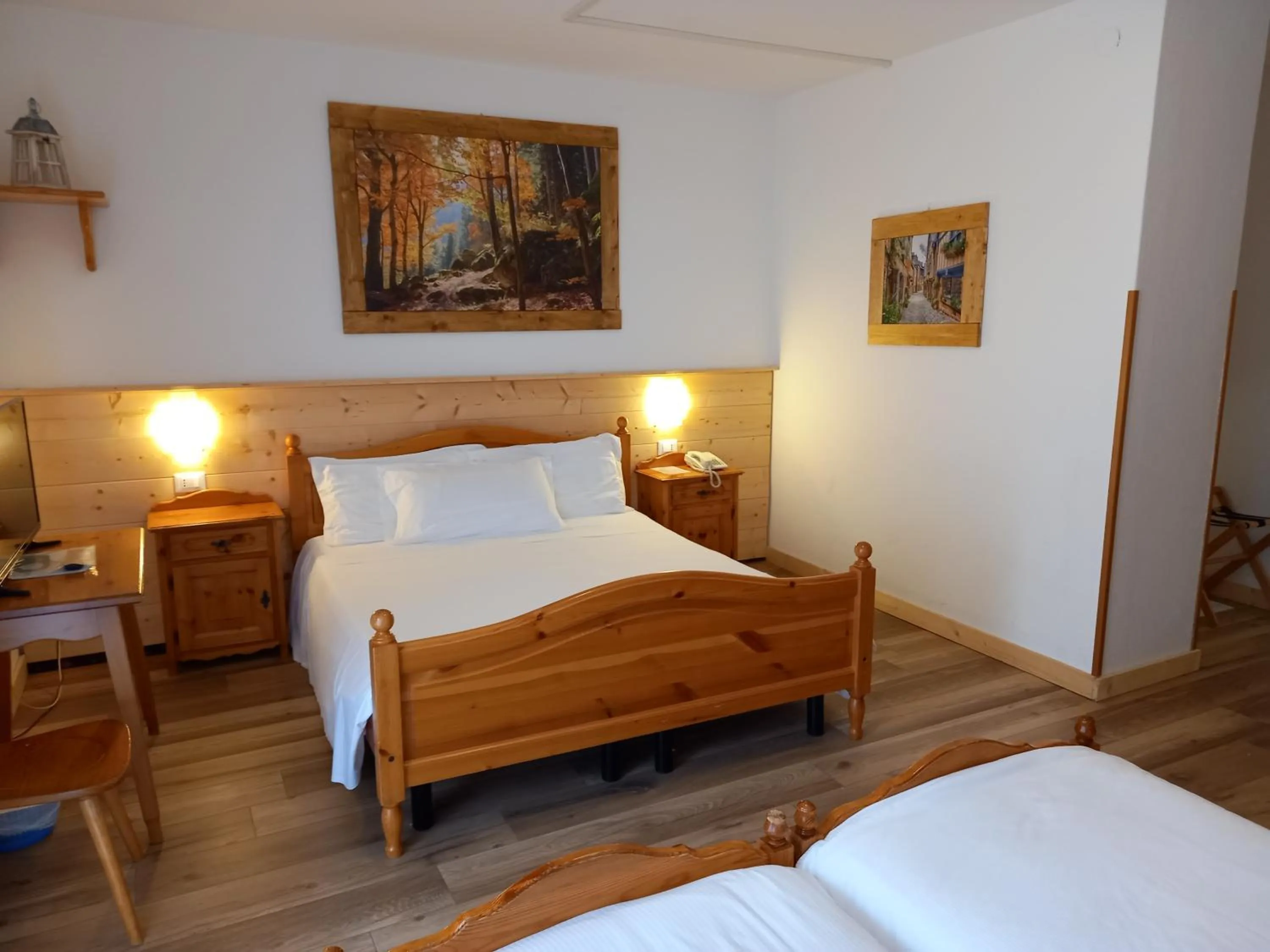 Bed in Albergo Scoiattolo