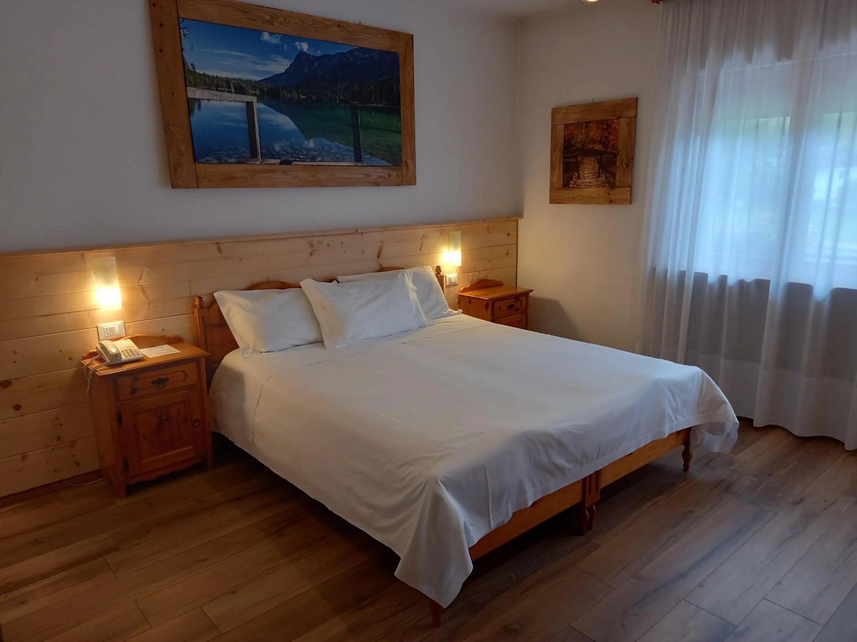 Bed in Albergo Scoiattolo