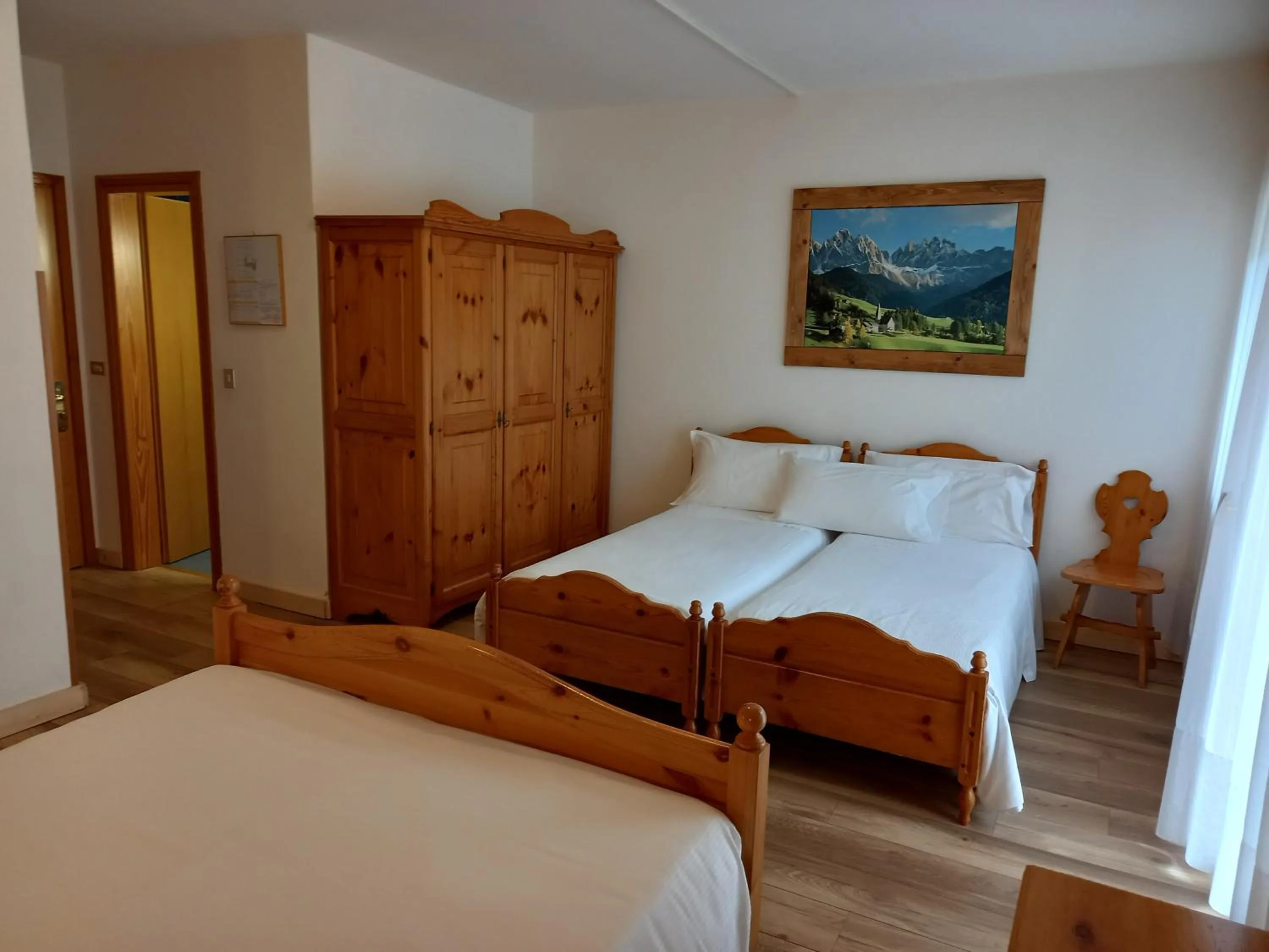 Bed in Albergo Scoiattolo