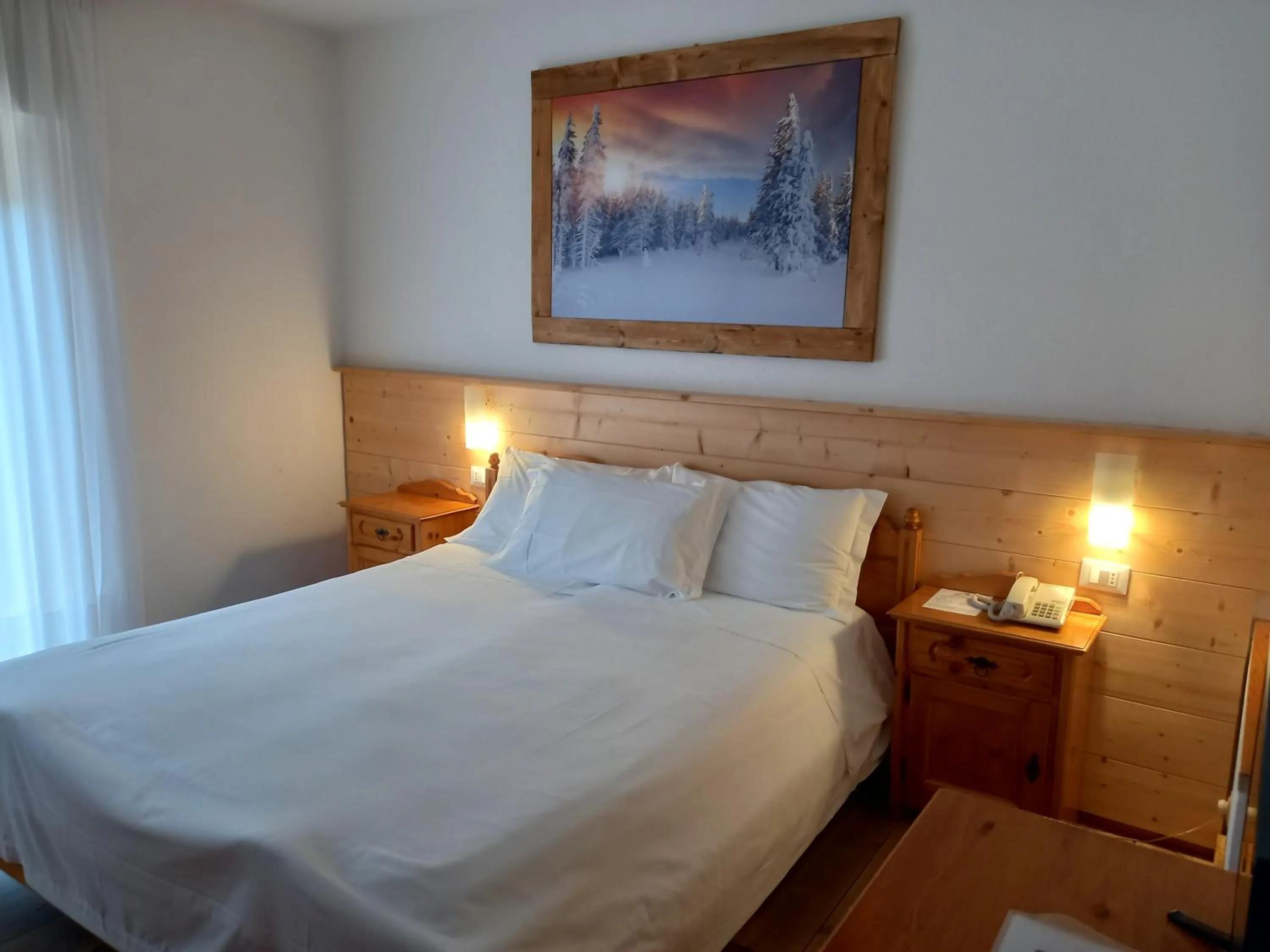 Bed in Albergo Scoiattolo