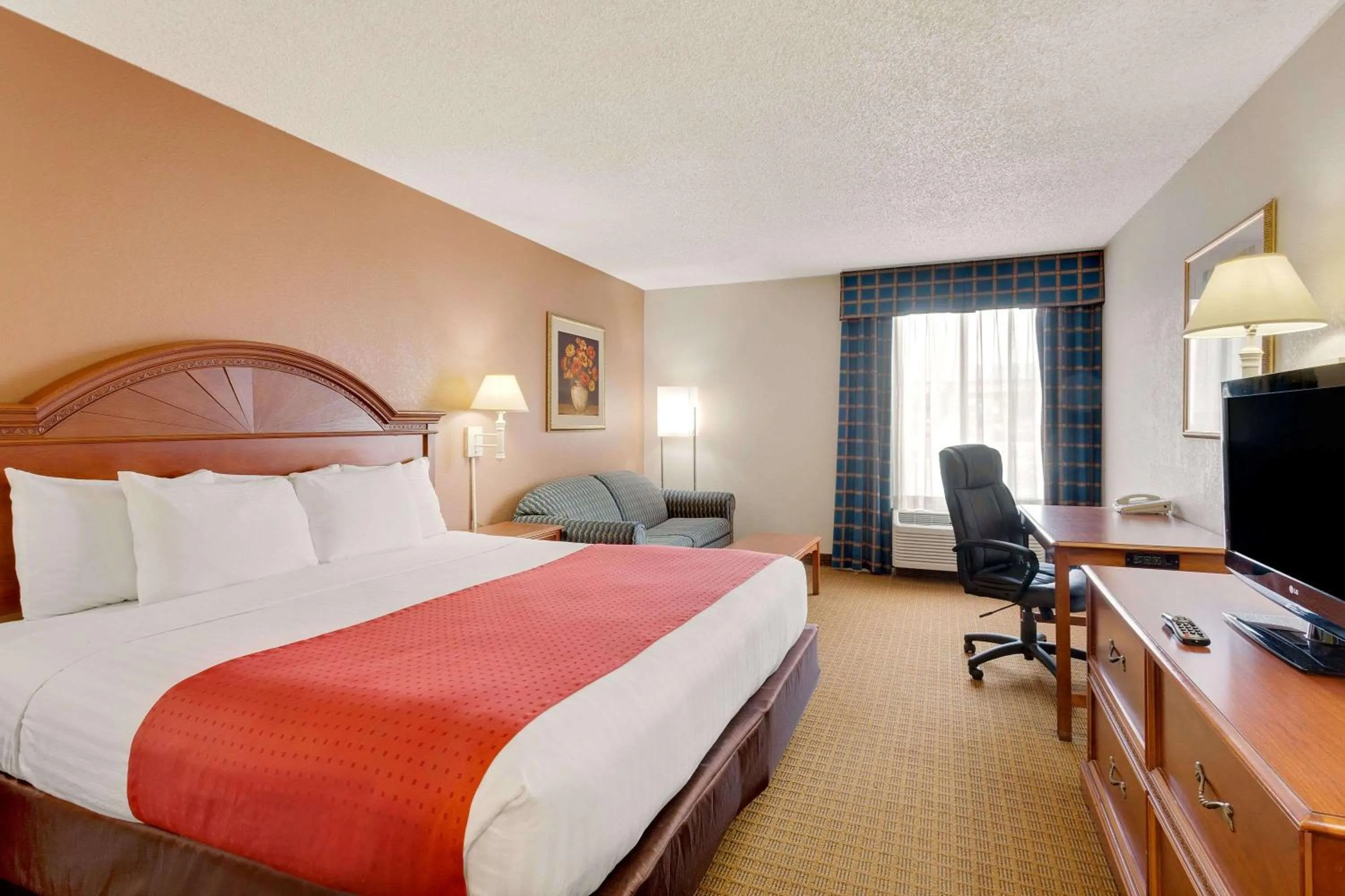 Photo of the whole room, Bed in Ramada by Wyndham Provo