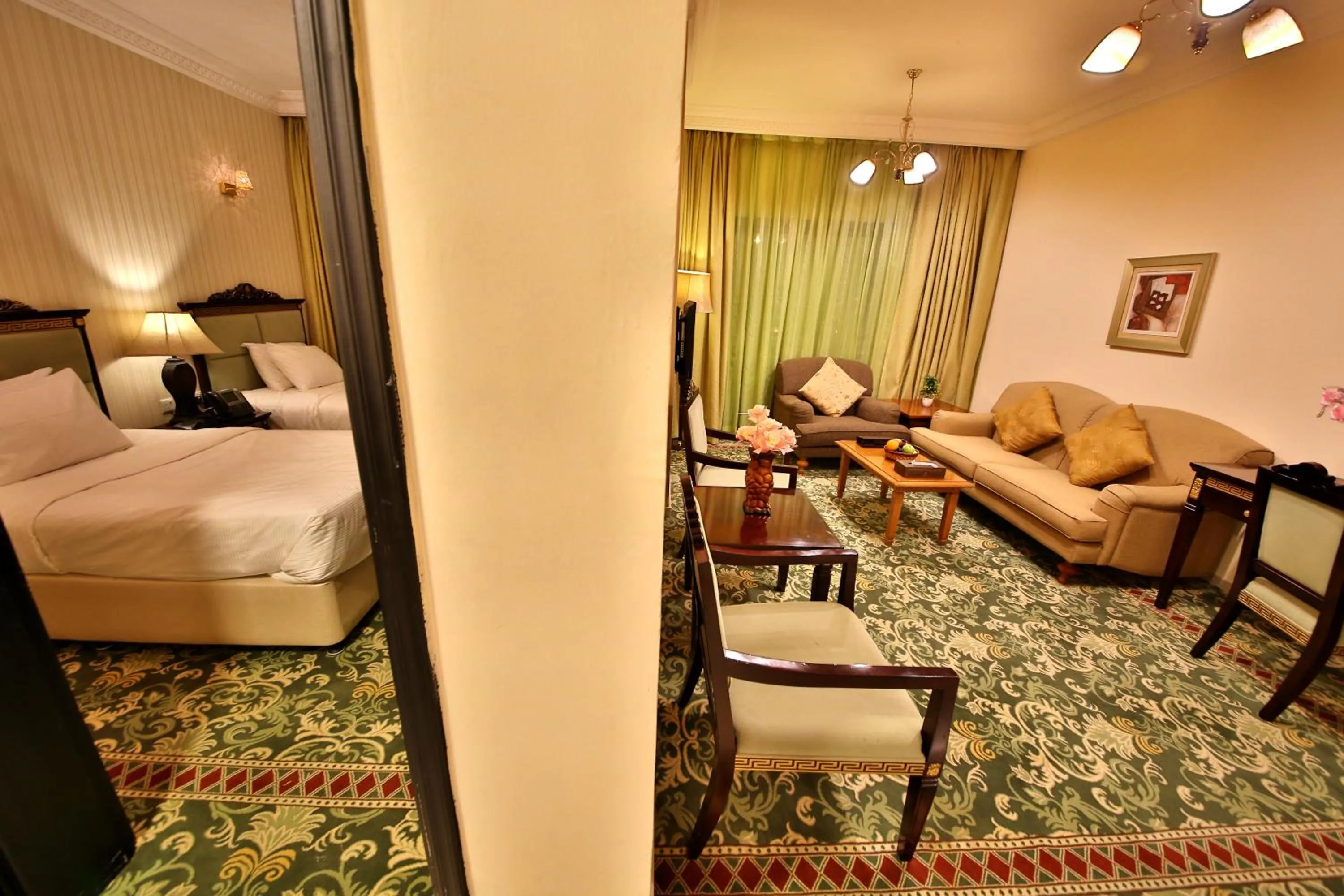 Living room, Bed in Midtown Furnished Apartments