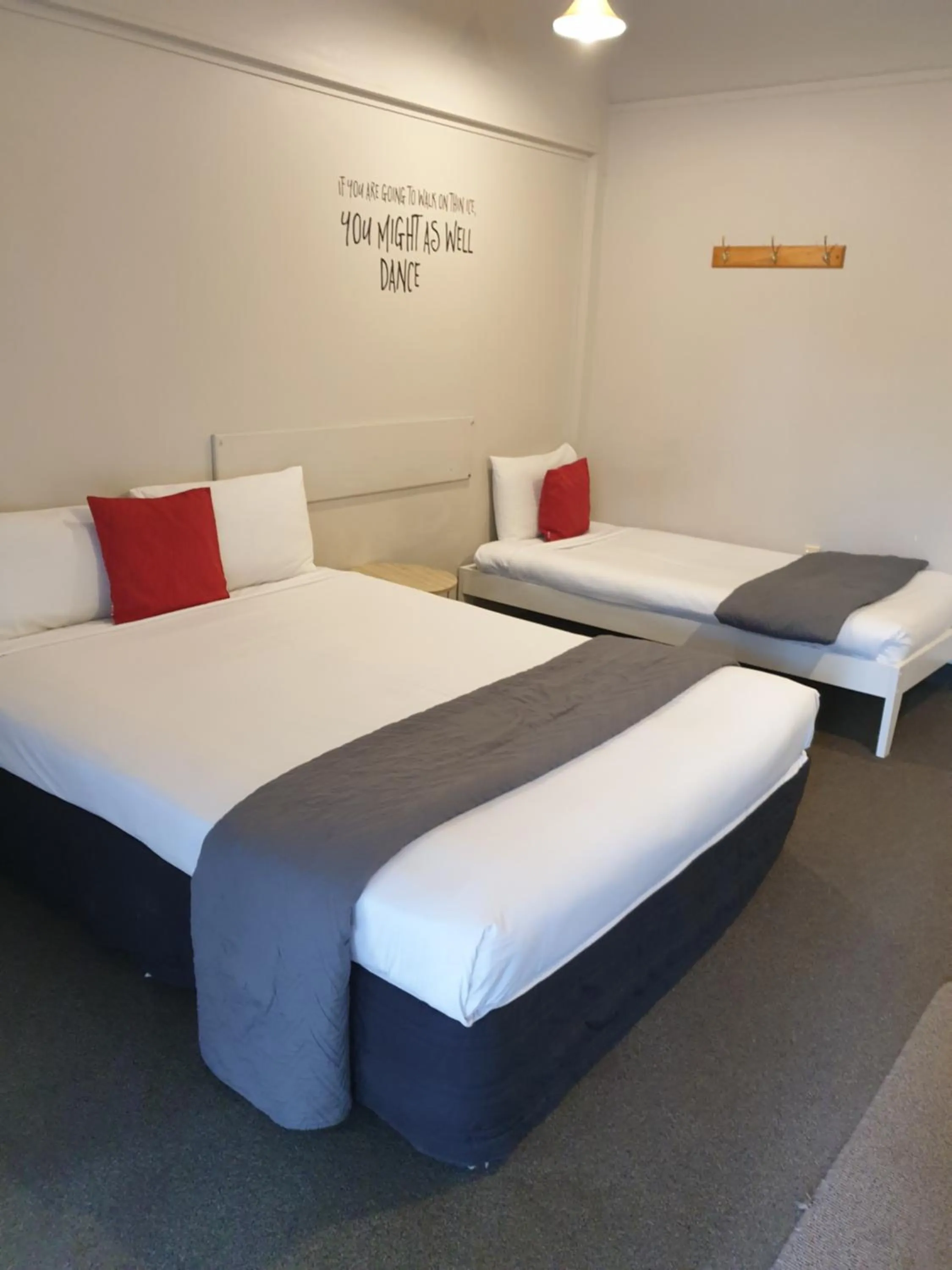 Bed in Woodlands Motel