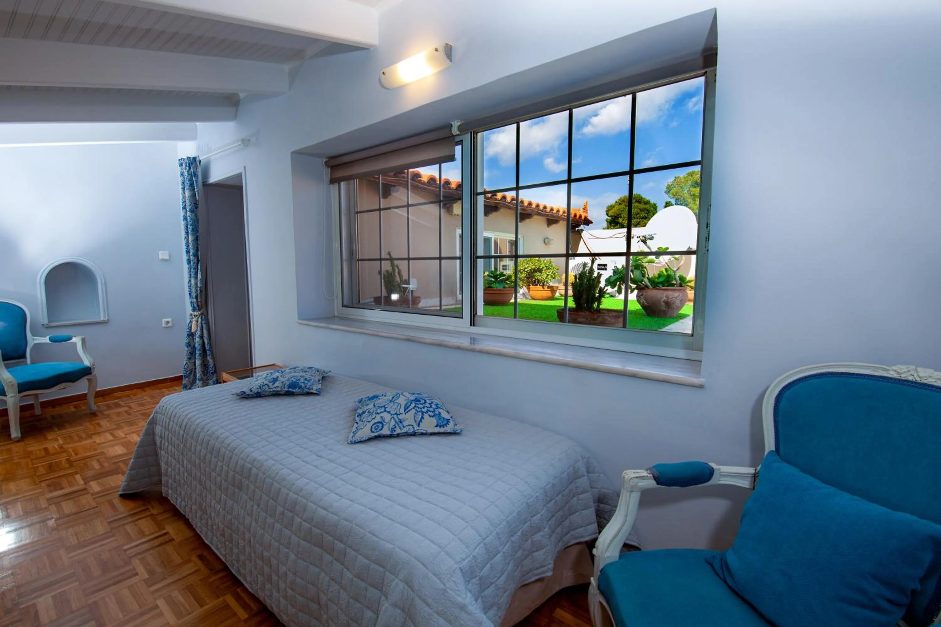 Bed in Natalie Apartments